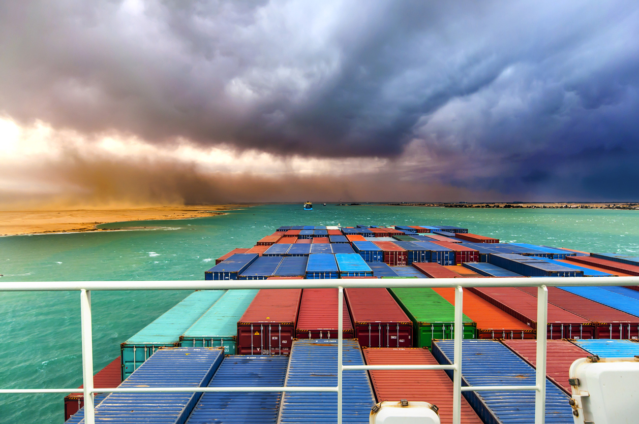 Desert Storm arising in Suez Canal, Egypt. Container Ship in the fore ground.