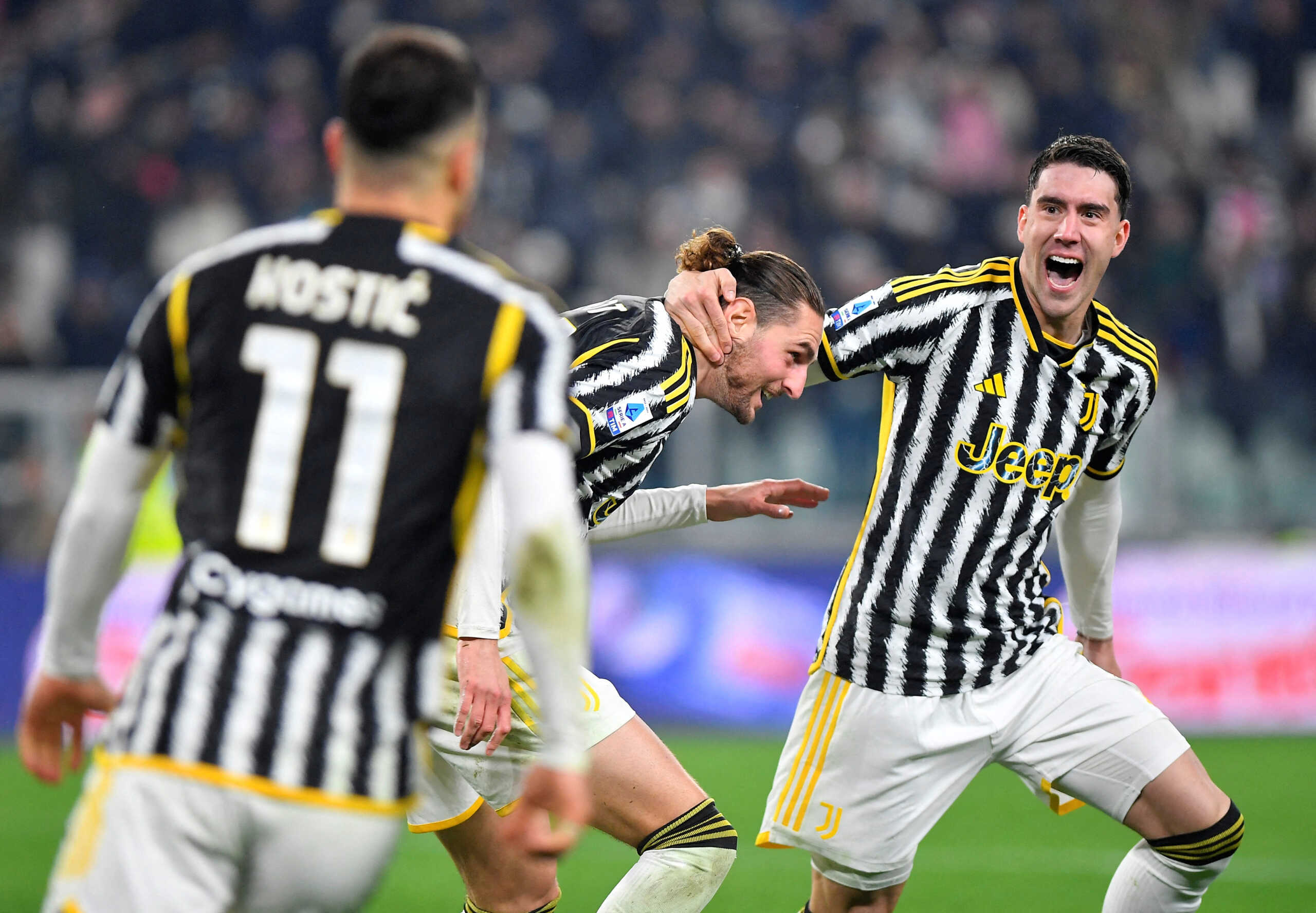 Soccer Football - Serie A - Juventus v AS Roma - Allianz Stadium, Turin, Italy - December 30, 2023  Juventus' Adrien Rabiot celebrates scoring their first goal with Dusan Vlahovic REUTERS