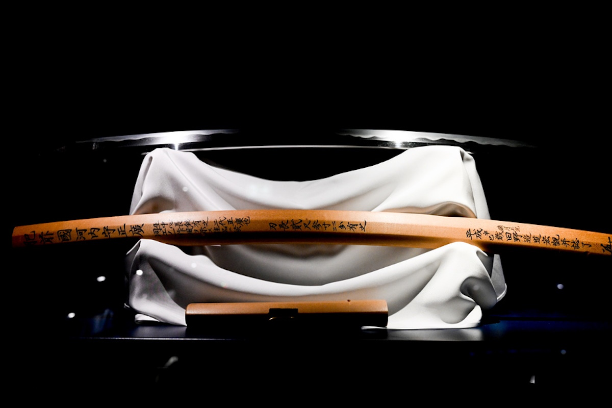 epa09924458 A Samurai's Katana sword and case on a rack are on display in the new Samurai Museum during a preview of their exhibition in Berlin,Germany, 03 May 2022. The Samurai Museum Berlin will open on 08 May at a new location in the Berlin-Mitte district of the German capital and will present one of the largest collections of authentic samurai artifacts outside of Japan. The new museum 'displays armour, helmets, masks, swords and sword armatures from the 8th to the 19th century' in about 1,000 exhibits from the private collection of Peter Janssen, the museumportal _berlin says.  EPA