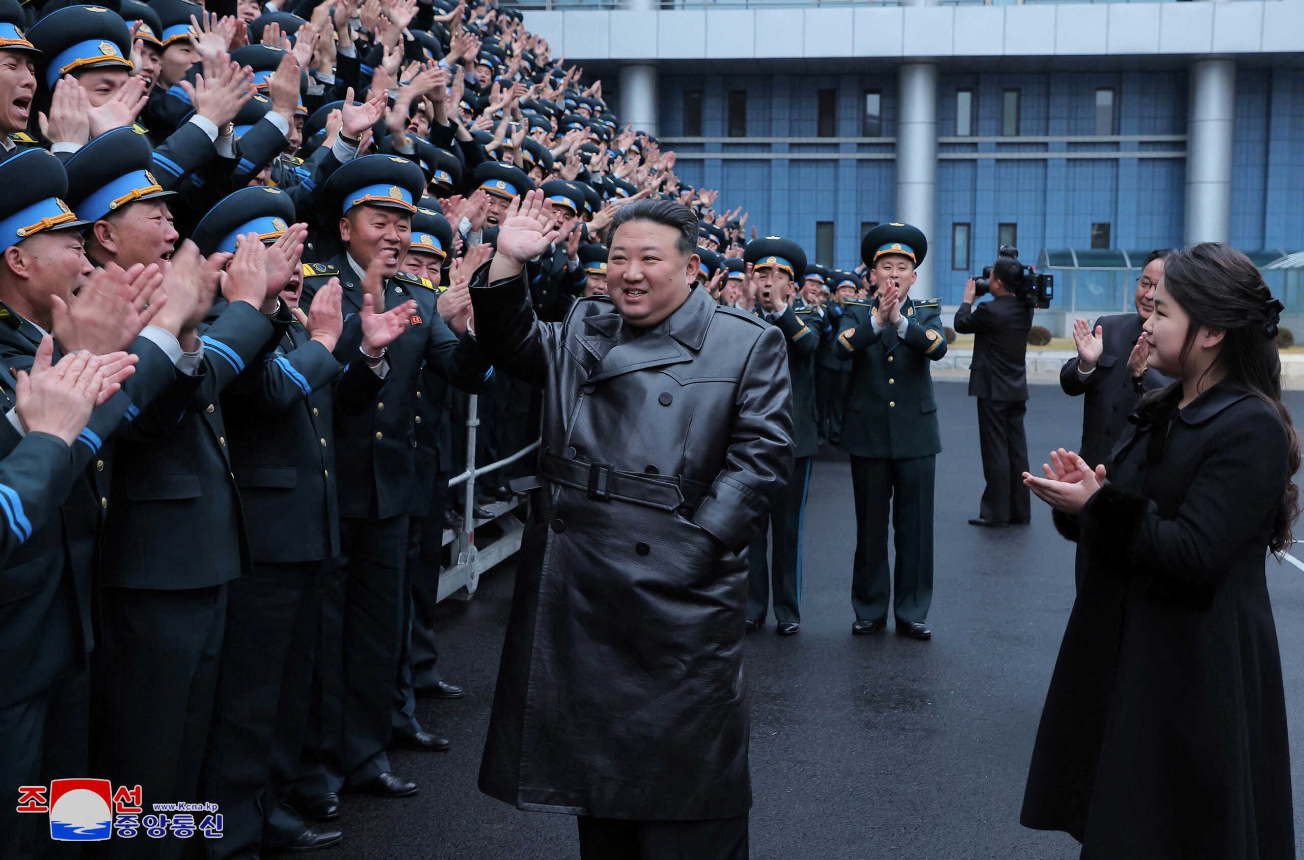 North Korea's leader Kim Jong-un waves during a visit to the General Administration of Aerospace Technology, in this picture released by the Korean Central News Agency on November 24, 2023. KCNA via REUTERS    ATTENTION EDITORS - THIS IMAGE WAS PROVIDED BY A THIRD PARTY. REUTERS IS UNABLE TO INDEPENDENTLY VERIFY THIS IMAGE. NO THIRD PARTY SALES. SOUTH KOREA OUT. NO COMMERCIAL OR EDITORIAL SALES IN SOUTH KOREA.