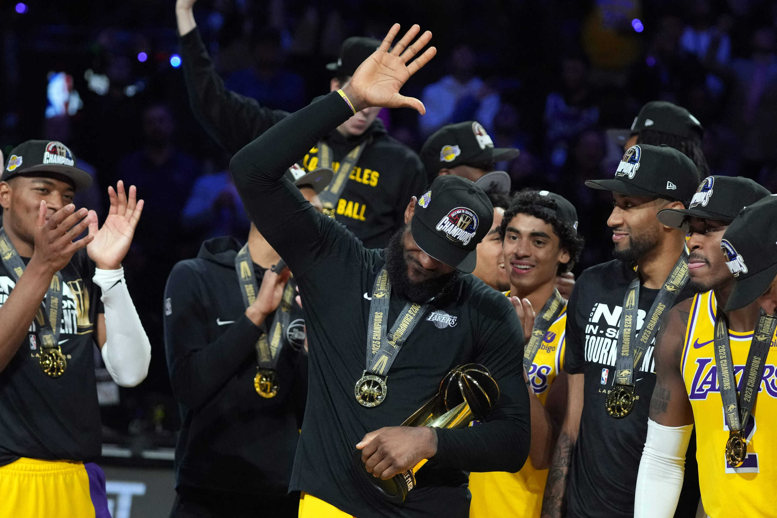 Dec 9, 2023; Las Vegas, Nevada, USA; Los Angeles Lakers forward LeBron James (23) celebrates with the MVP Trophy after winning the in season tournament championship final against the Indiana Pacers at T-Mobile Arena. Mandatory Credit: Kyle Terada-USA TODAY Sports