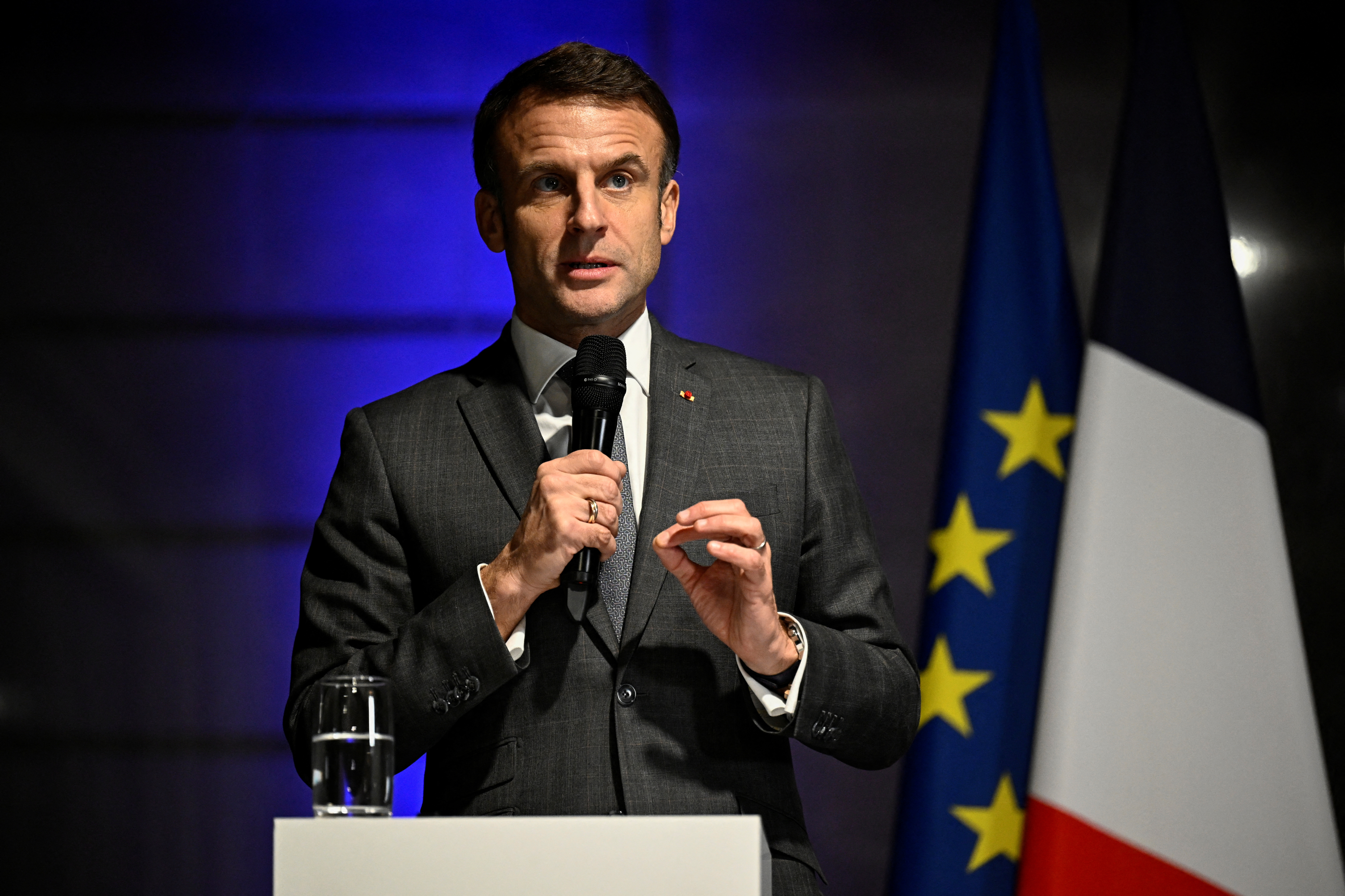 France's President Emmanuel Macron delivers a speech during a ceremony before France's handball team players at the presidential Elysee Palace in Paris, December 18, 2023, one day after they won the gold medal after the final between France and Norway of the IHF World Women's Handball Championship in Herning, Denmark.   Julien de Rosa
