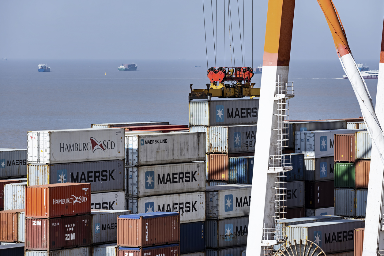 Container are being loaded on a container ship at Shanghai Port