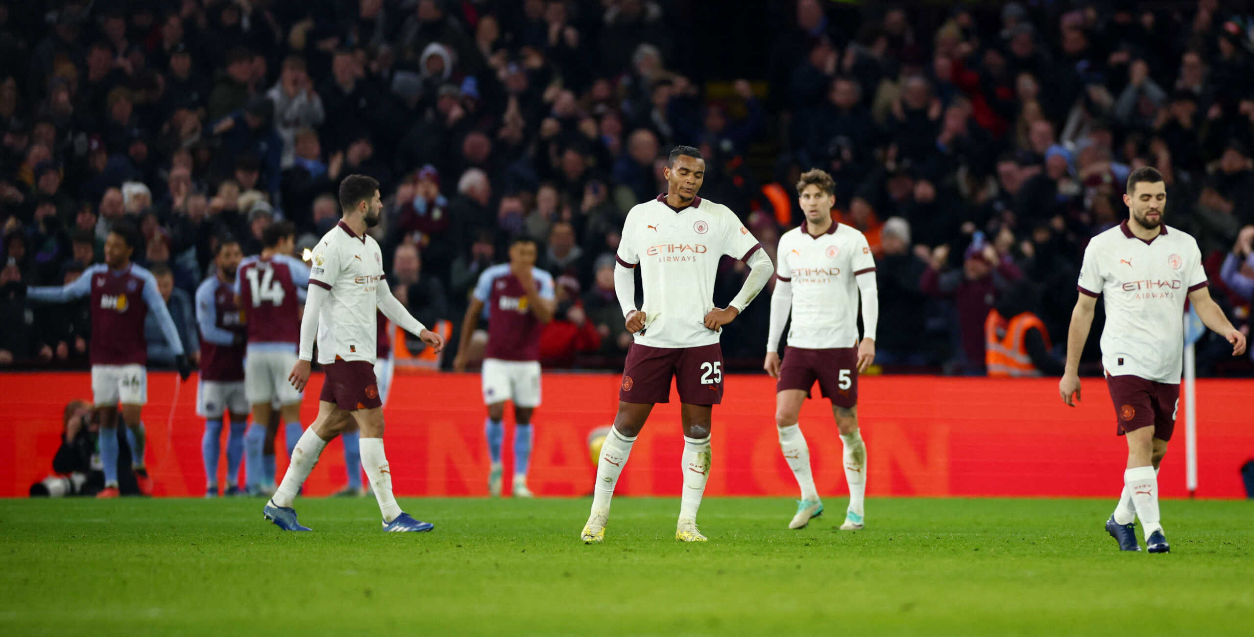 Soccer Football - Premier League - Aston Villa v Manchester City - Villa Park, Birmingham, Britain - December 6, 2023  Manchester City's Manuel Akanji looks dejected after Aston Villa's Leon Bailey scores their first goal Action Images via Reuters