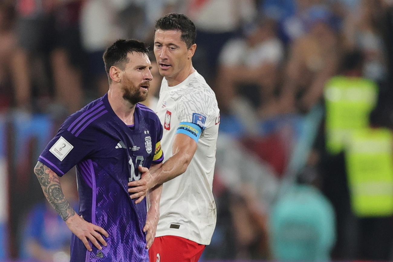 epa10340186 Robert Lewandowski (R) of Poland and Lionel Messi of Argentina react during the FIFA World Cup 2022 group C soccer match between Poland and Argentina at Stadium 947 in Doha, Qatar, 30 November 2022.  EPA