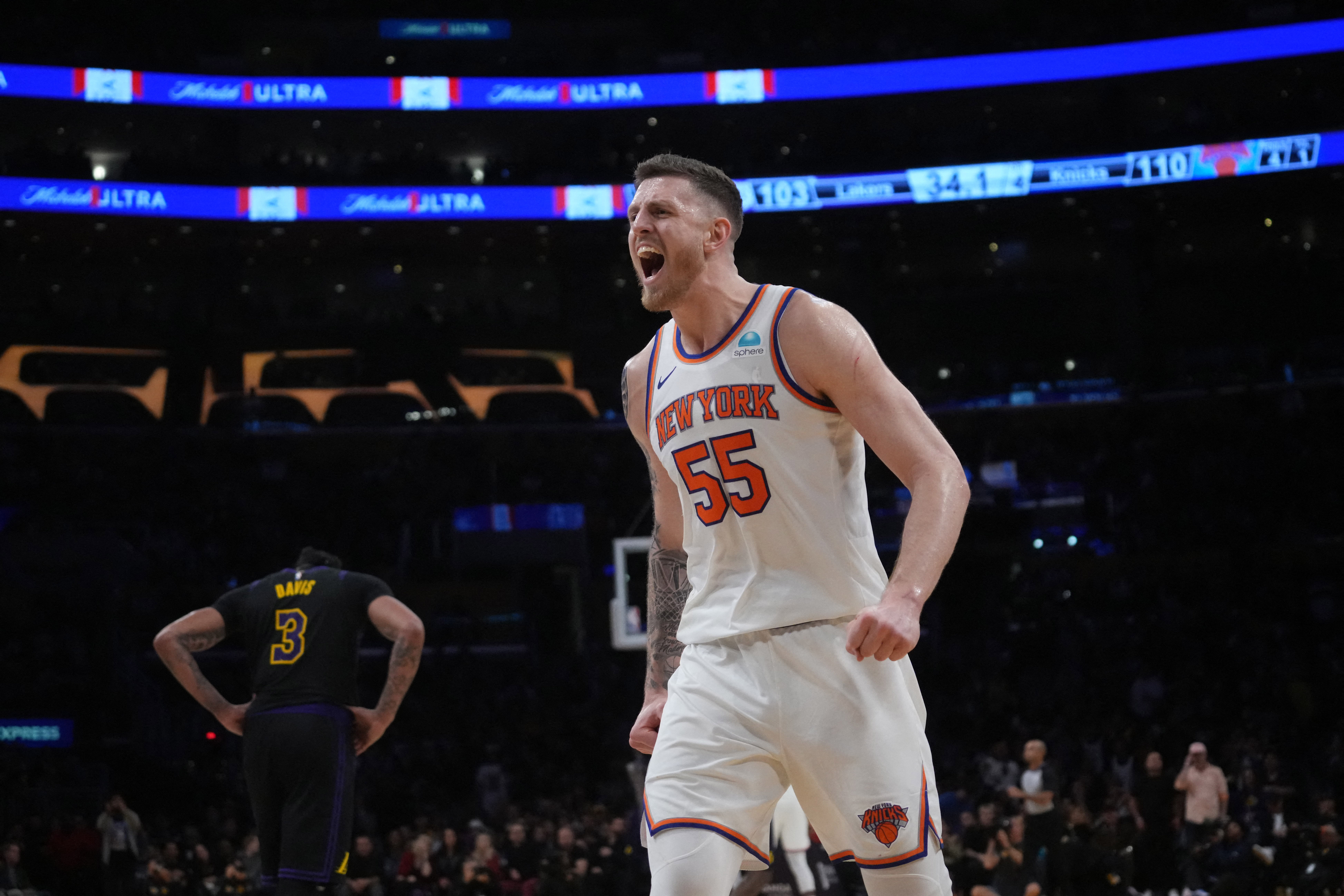 Dec 18, 2023; Los Angeles, California, USA; New York Knicks center Isaiah Hartenstein (55) celebrates against the Los Angeles Lakers in the second half at Crypto.com Arena. Mandatory Credit: Kirby Lee-USA TODAY Sports