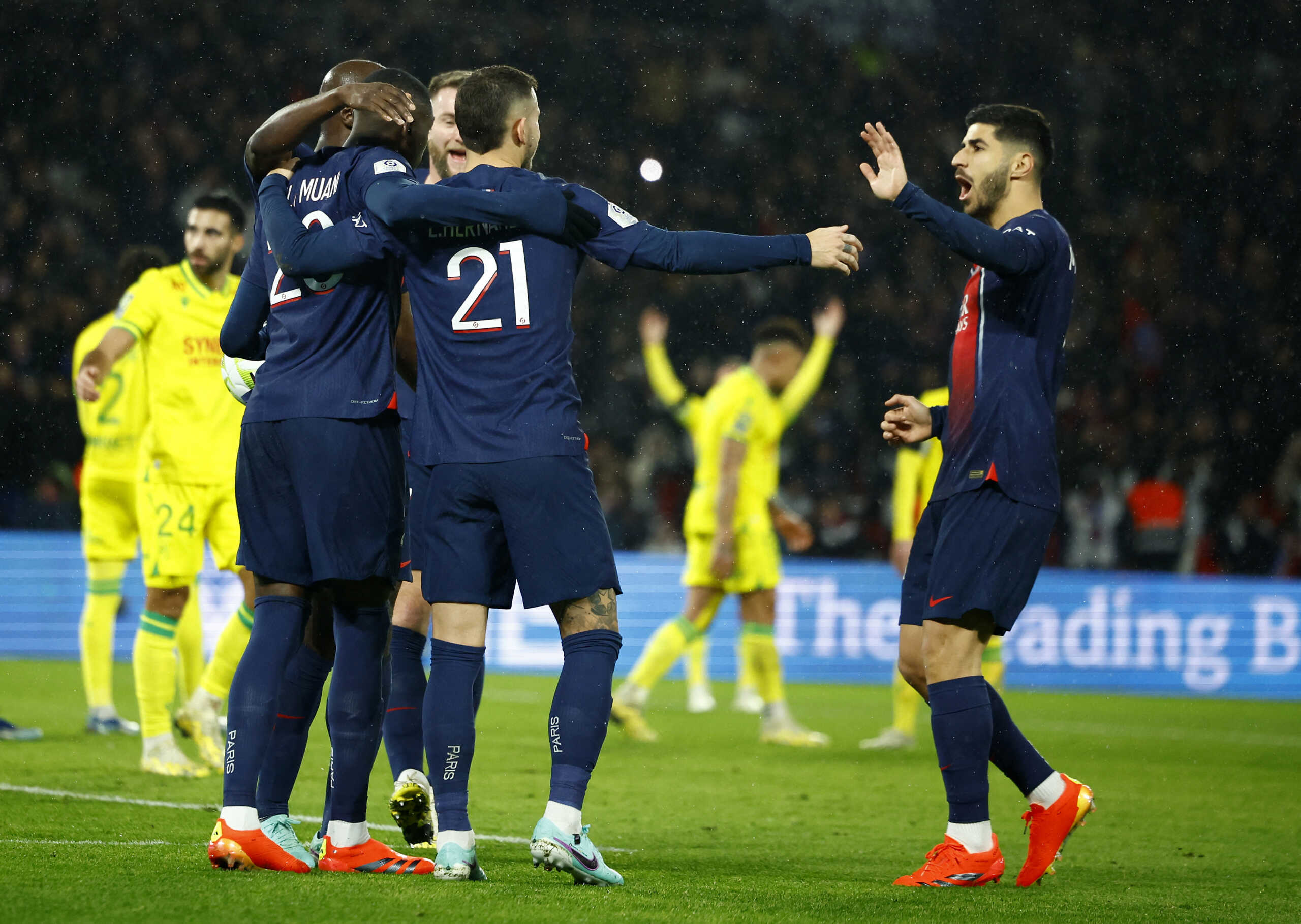 Soccer Football - Ligue 1 - Paris St Germain v Nantes - Parc des Princes, Paris, France - December 9, 2023 Paris St Germain's Randal Kolo Muani celebrates scoring their second goal with teammates REUTERS