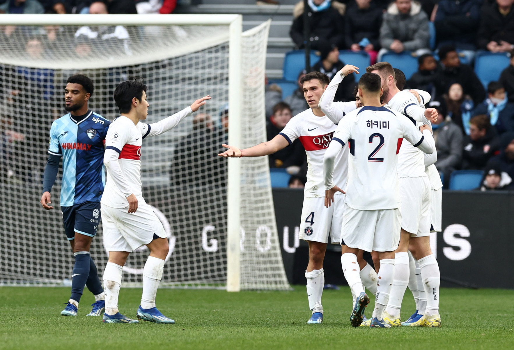 Soccer Football - France - Ligue 1 - Le Havre v Paris St Germain - Stade Oceane, Le Havre, France - December 3, 2023  Paris St Germain's Vitinha celebrates scoring their second goal with teammates REUTERS