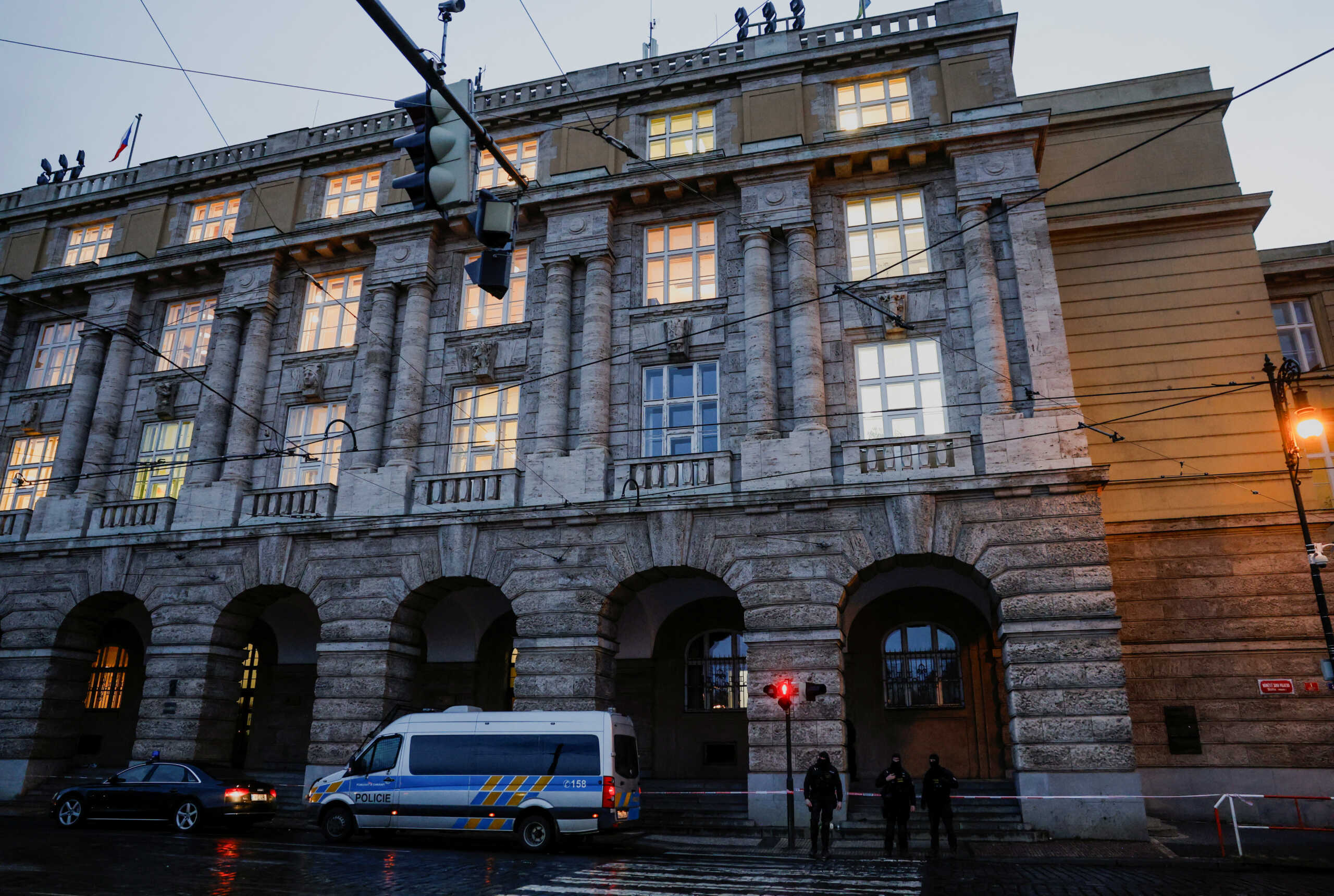 Members of the police stand guard following a shooting at one of Charles University's buildings in Prague, Czech Republic, December 22, 2023. REUTERS