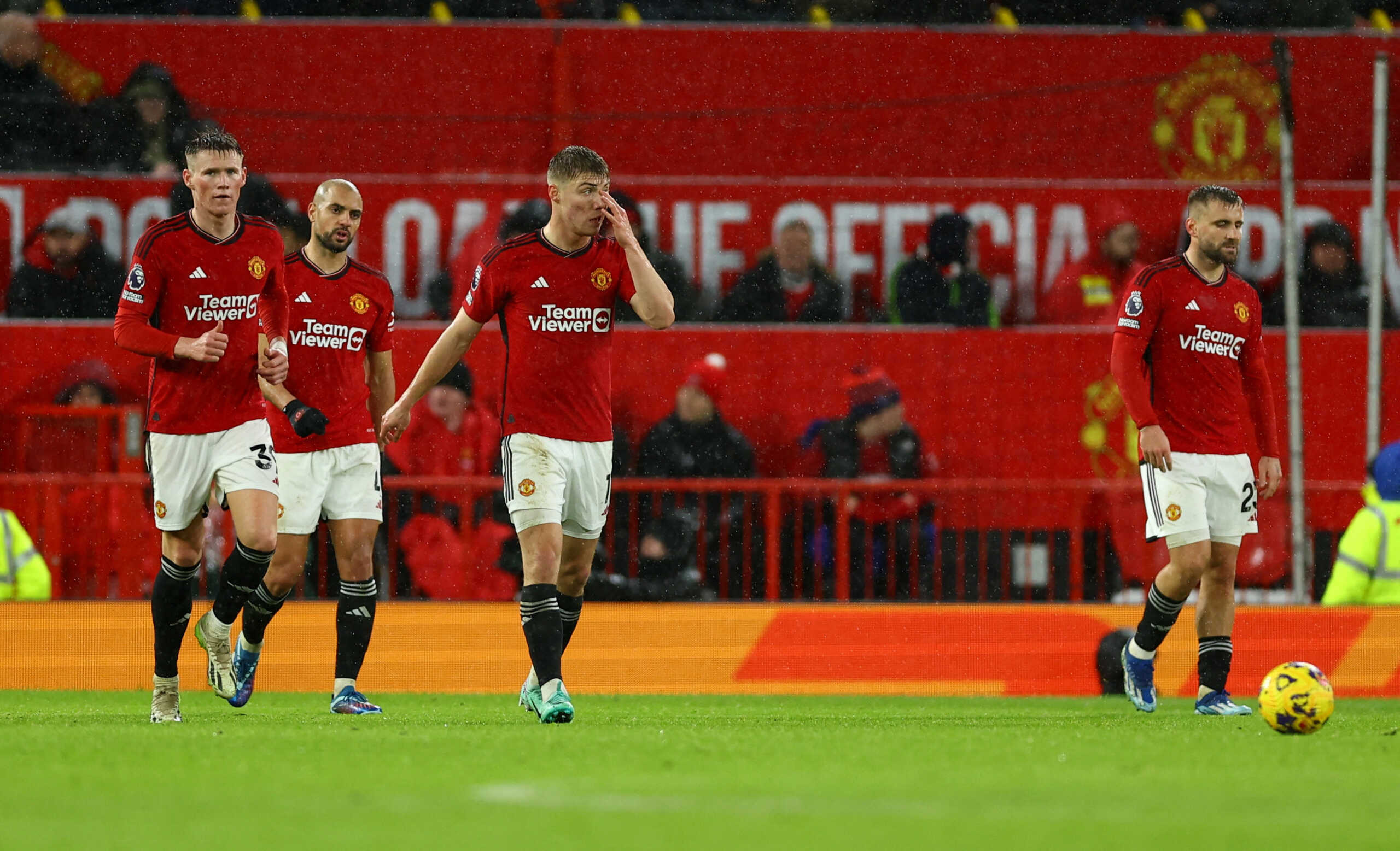 Soccer Football - Premier League - Manchester United v AFC Bournemouth - Old Trafford, Manchester, Britain - December 9, 2023 Manchester United's Rasmus Hojlund, Scott McTominay and teammates look dejected after AFC Bournemouth's Marcos Senesi scores their third goal REUTERS