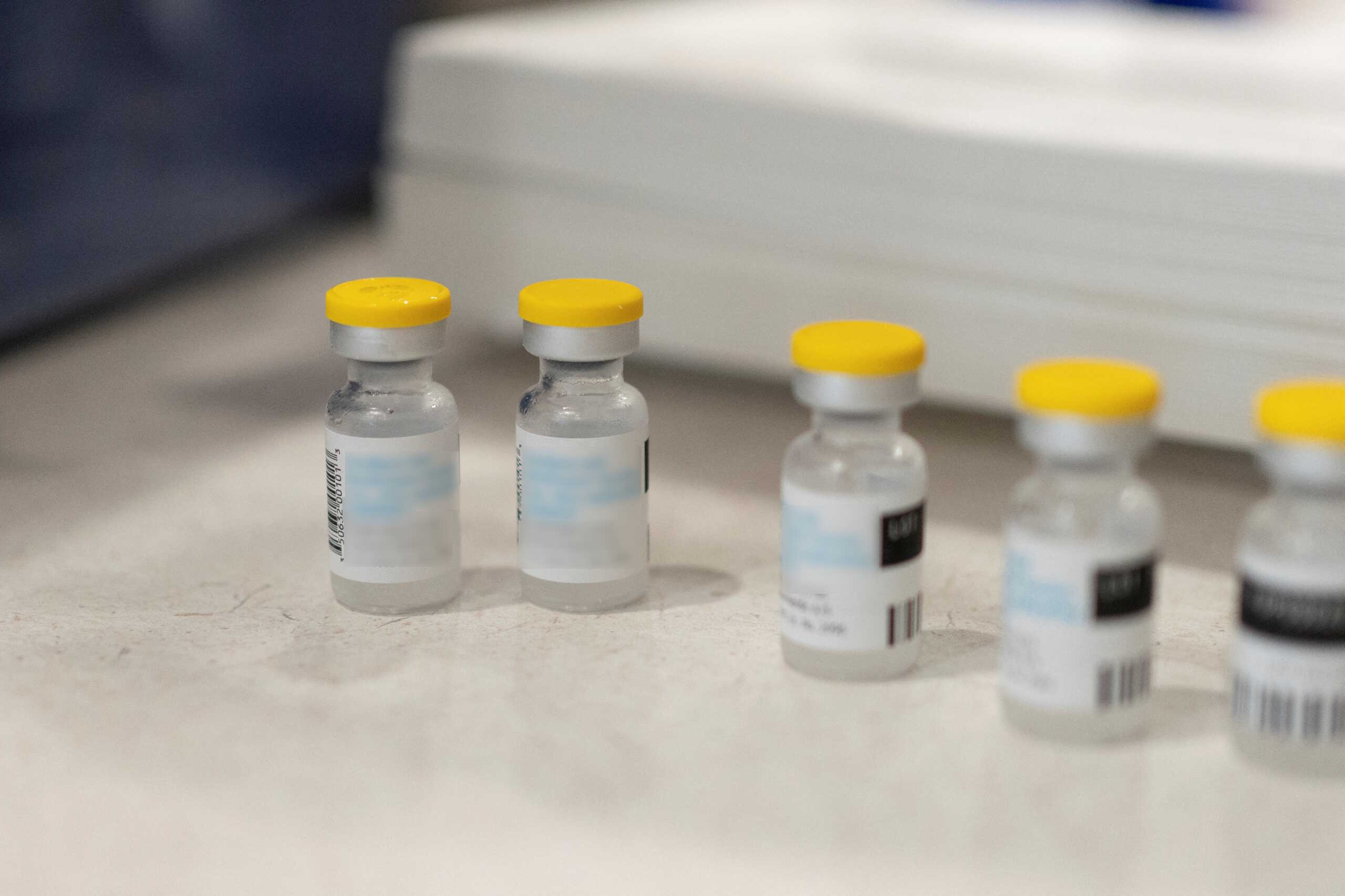 FILE PHOTO: Vials of the JYNNEOS smallpox and monkeypox vaccine are placed on a table during a clinic offered by the Pima County Department of Public Health at Abrams Public Health Center in Tucson, Arizona, U.S., August 20, 2022.  REUTERS