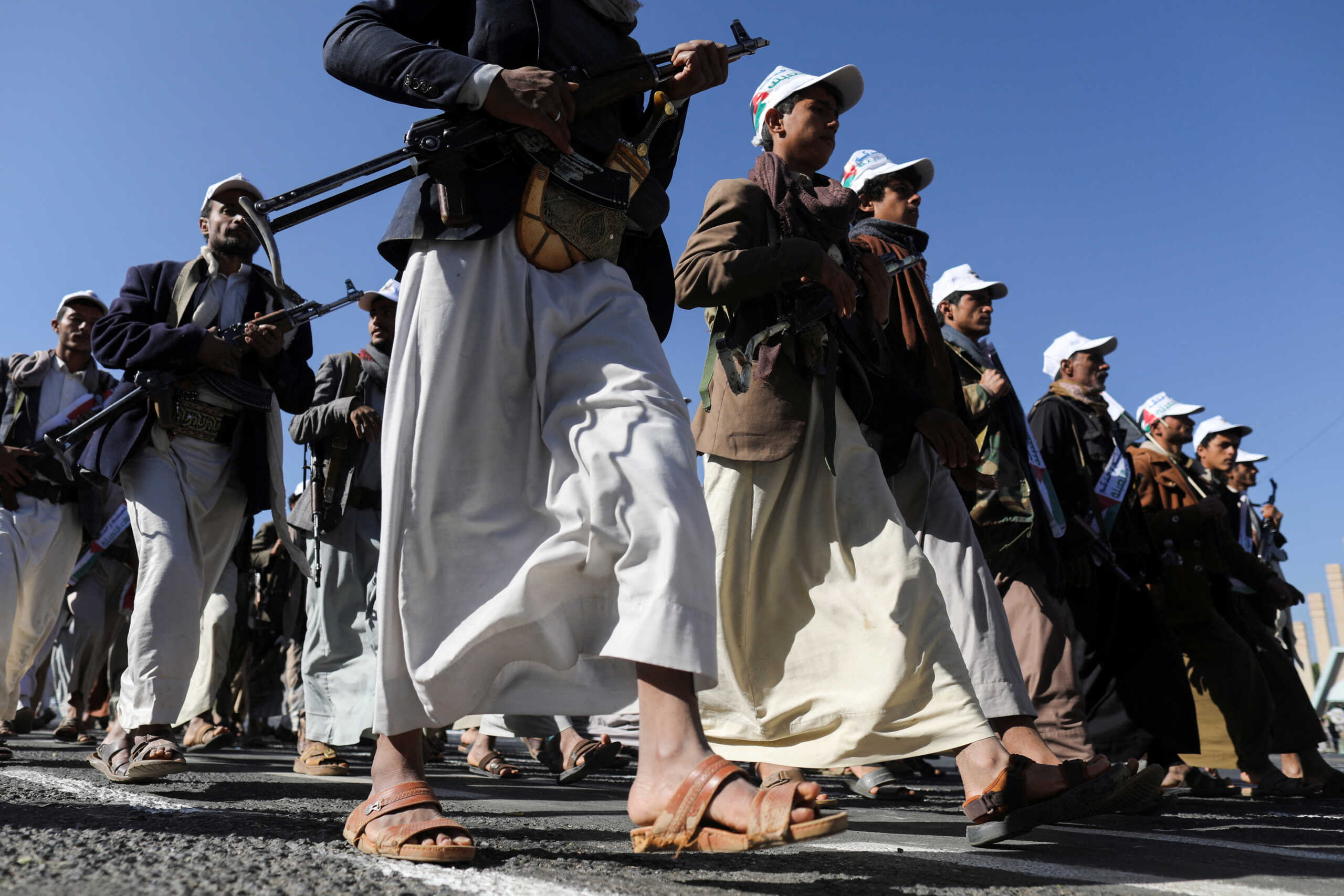 Newly recruited fighters who joined a Houthi military force intended to be sent to fight in support of the Palestinians in the Gaza Strip, march during a parade in Sanaa, Yemen December 2, 2023. REUTERS