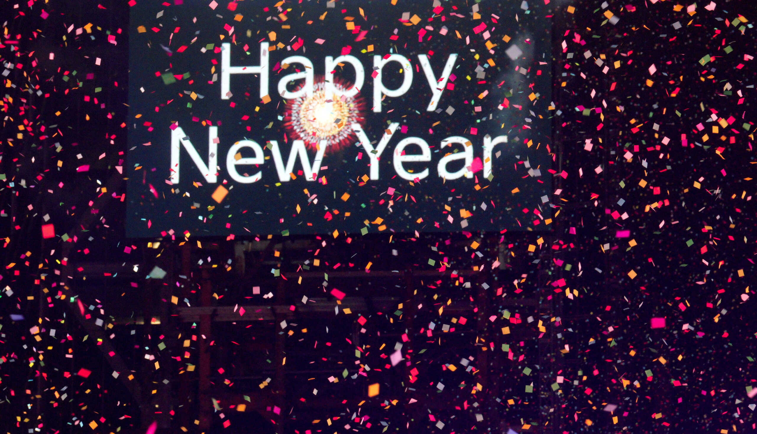Confetti flies around after the clock strikes midnight during New Year celebrations at Times Square, in New York City, New York, U.S., January 1, 2024. REUTERS