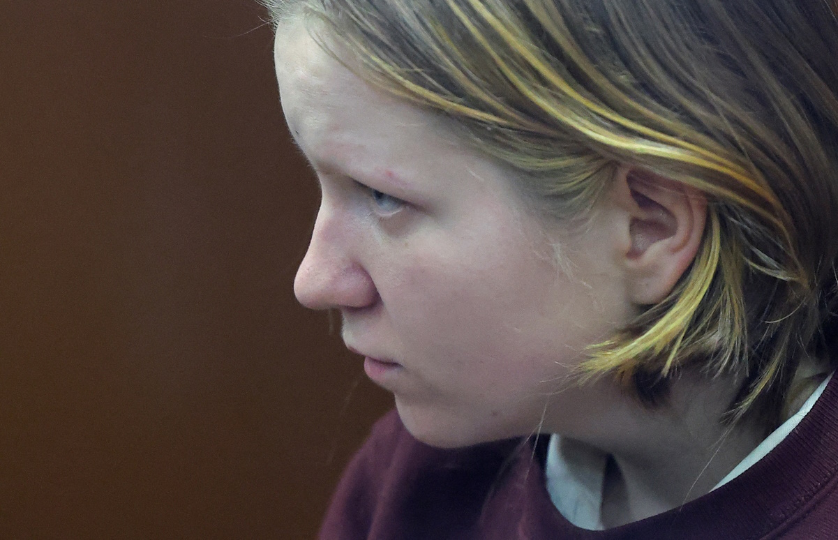 FILE PHOTO: Darya Trepova, who is suspected in the killing of Russian military blogger Maxim Fomin, widely known by the name of Vladlen Tatarsky, sits behind a glass wall of an enclosure for defendants during a court hearing in Moscow, Russia, April 4, 2023. REUTERS
