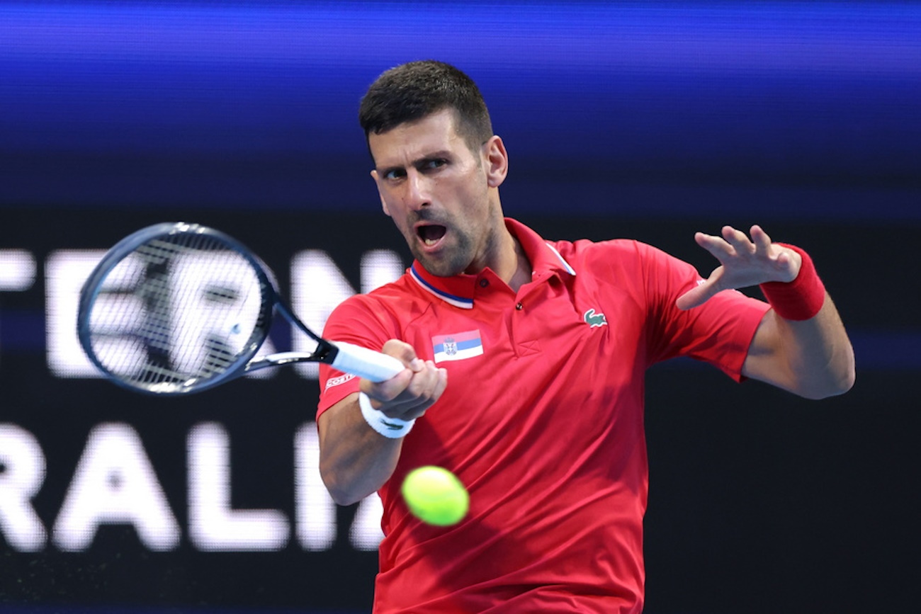 epa11054790 Novak Djokovic of Serbia in action against Alex De Minaur of Australia during their quarterfinal match of the 2024 United Cup at RAC Arena in Perth, Australia, 03 January 2024.  EPA