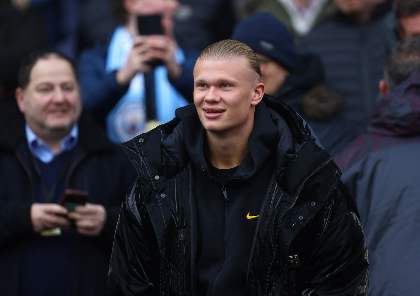 Soccer Football -  FA Cup - Third Round - Manchester City v Huddersfield Town - Etihad Stadium, Manchester, Britain - January 7, 2024 Manchester City's Erling Braut Haaland is pictured in the stands before the match Action Images via Reuters