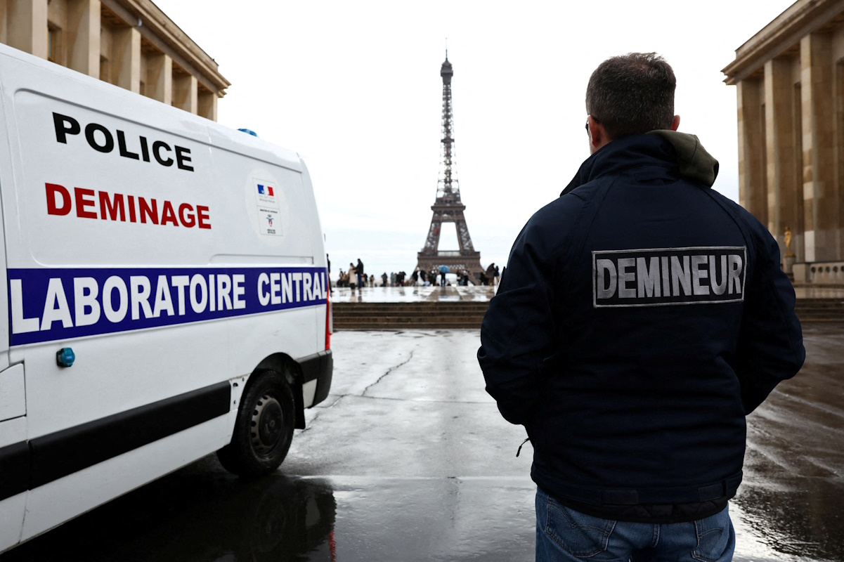 FILE PHOTO: Frederic, member of Paris police bomb squad, intervenes at the Trocadero Square near the Eiffel Tower in Paris as the bomb-disposal team gear up for heightened security operations for Paris 2024 Olympic and Paralympic Games, France, December 4, 2023. REUTERS
