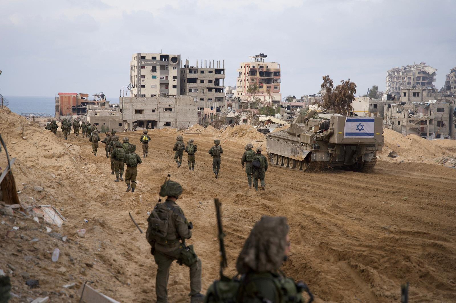 Israeli soldiers operate in the Gaza Strip amid the ongoing conflict between Israel and the Palestinian Islamist group Hamas, in this handout picture released on January 2, 2024. Israel Defense Forces
