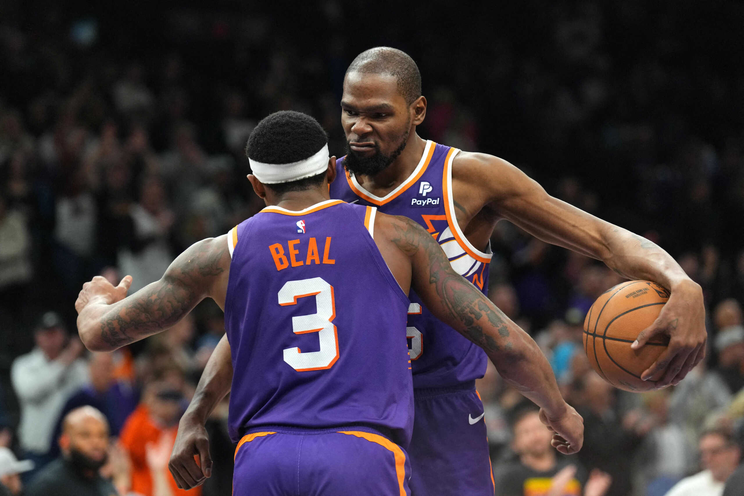 Jan 21, 2024; Phoenix, Arizona, USA; Phoenix Suns guard Bradley Beal (3) and Phoenix Suns forward Kevin Durant (35) hug during the second half of the game against the Indiana Pacers at Footprint Center. Mandatory Credit: Joe Camporeale-USA TODAY Sports
