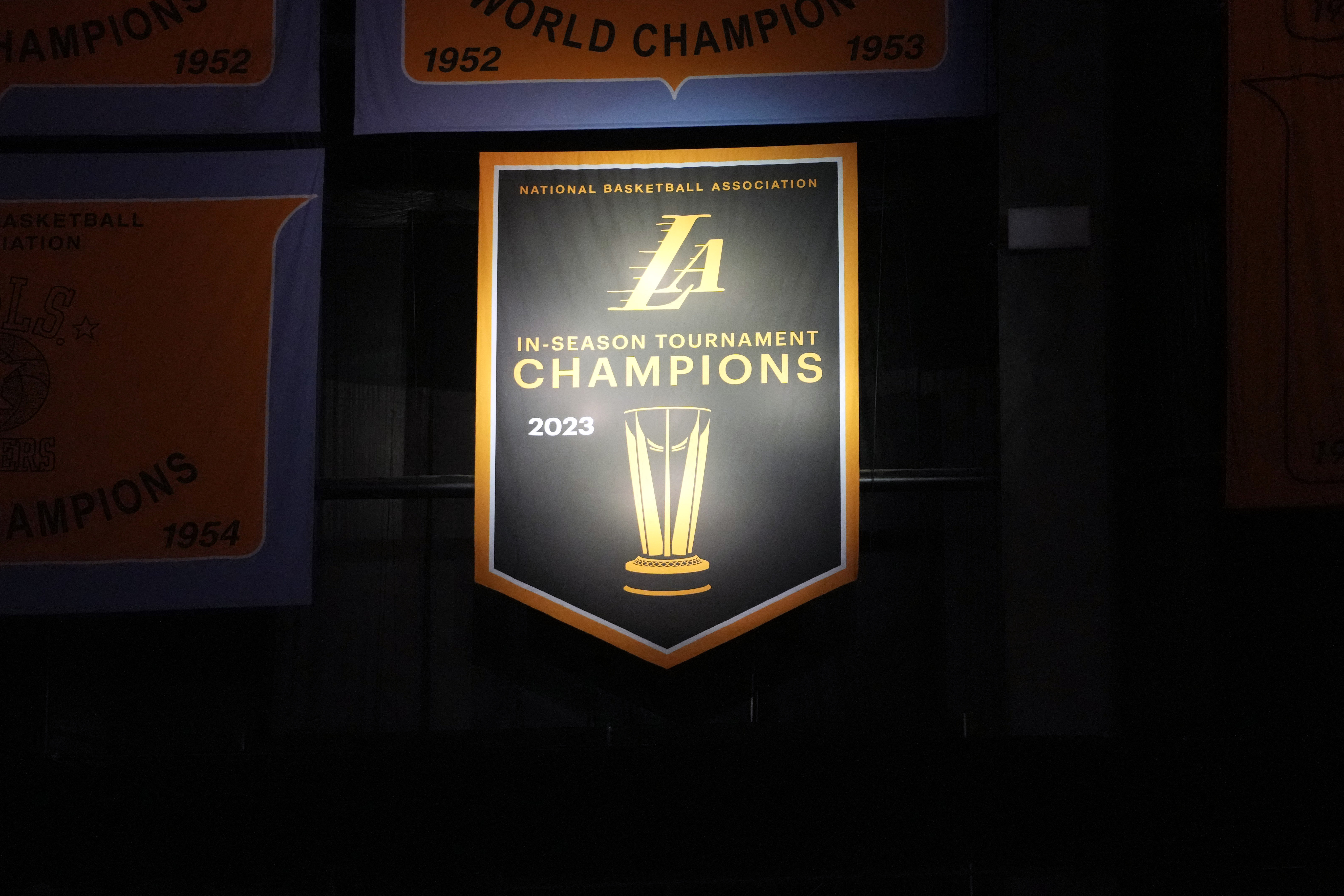 Dec 18, 2023; Los Angeles, California, USA; The Los Angeles Lakers 2023 In-Season Tournament Championship banner is unveiled at the Crypto.com Arena. Mandatory Credit: Kirby Lee-USA TODAY Sports