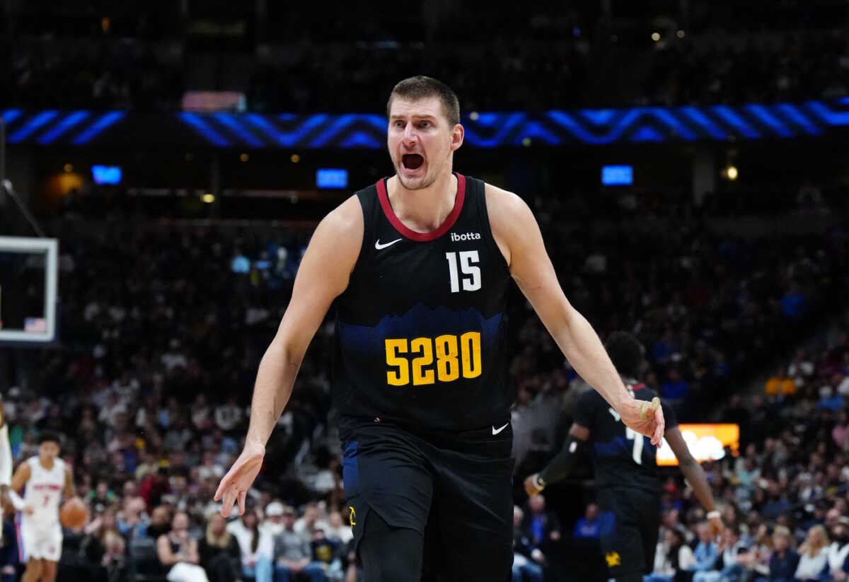 Jan 7, 2024; Denver, Colorado, USA; Denver Nuggets center Nikola Jokic (15) reacts in the first half against the Detroit Pistons at Ball Arena. Mandatory Credit: Ron Chenoy-USA TODAY Sports