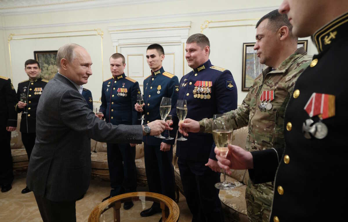 Russia's President Vladimir Putin attends a meeting with service members, involved in the country's military campaign in Ukraine, at the Novo-Ogaryovo state residence outside Moscow, Russia, January 1, 2024. Sputnik