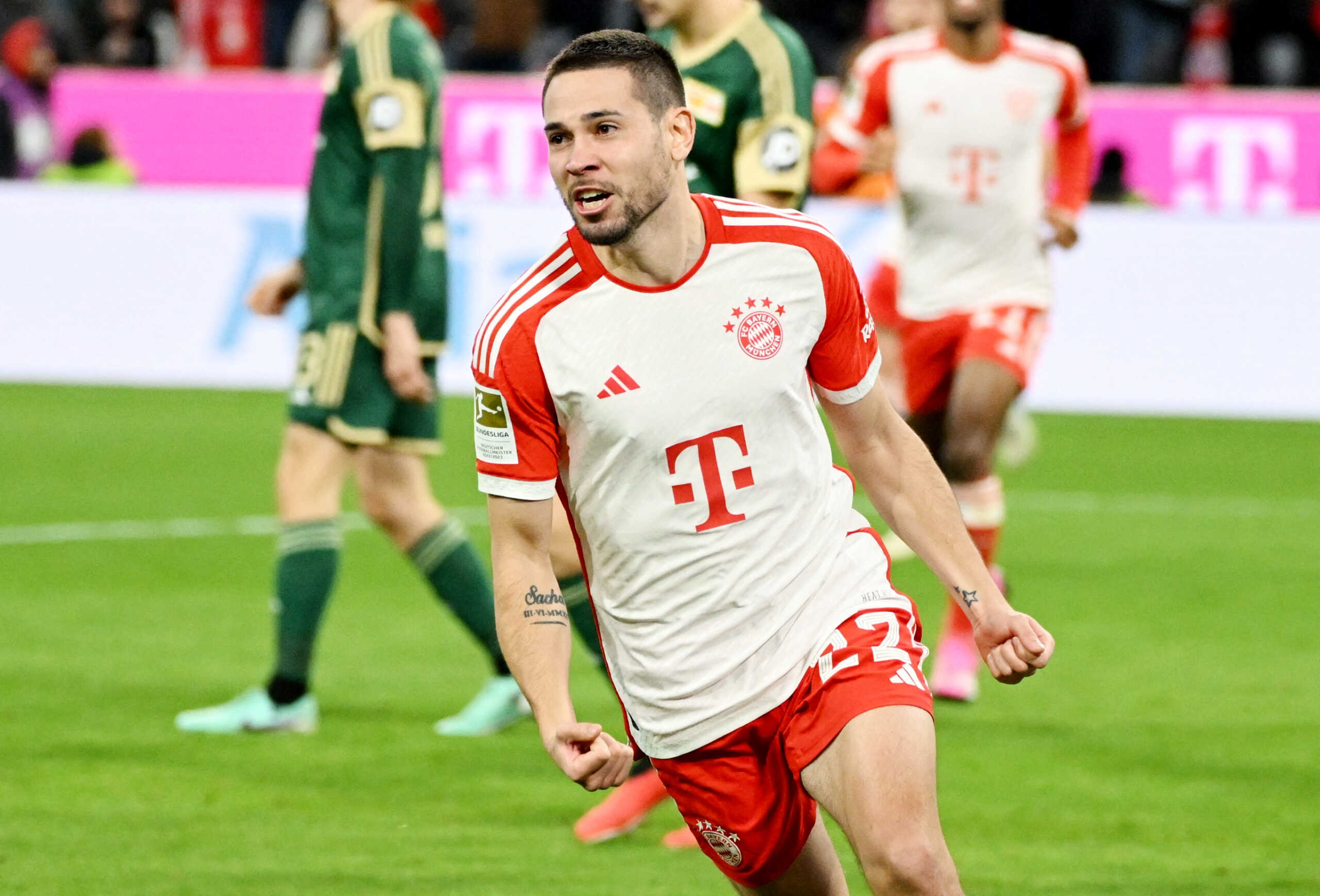 Soccer Football - Bundesliga - Bayern Munich v 1. FC Union Berlin - Allianz Arena, Munich, Germany - January 24, 2024 Bayern Munich's Raphael Guerreiro celebrates scoring their first goal REUTERS
