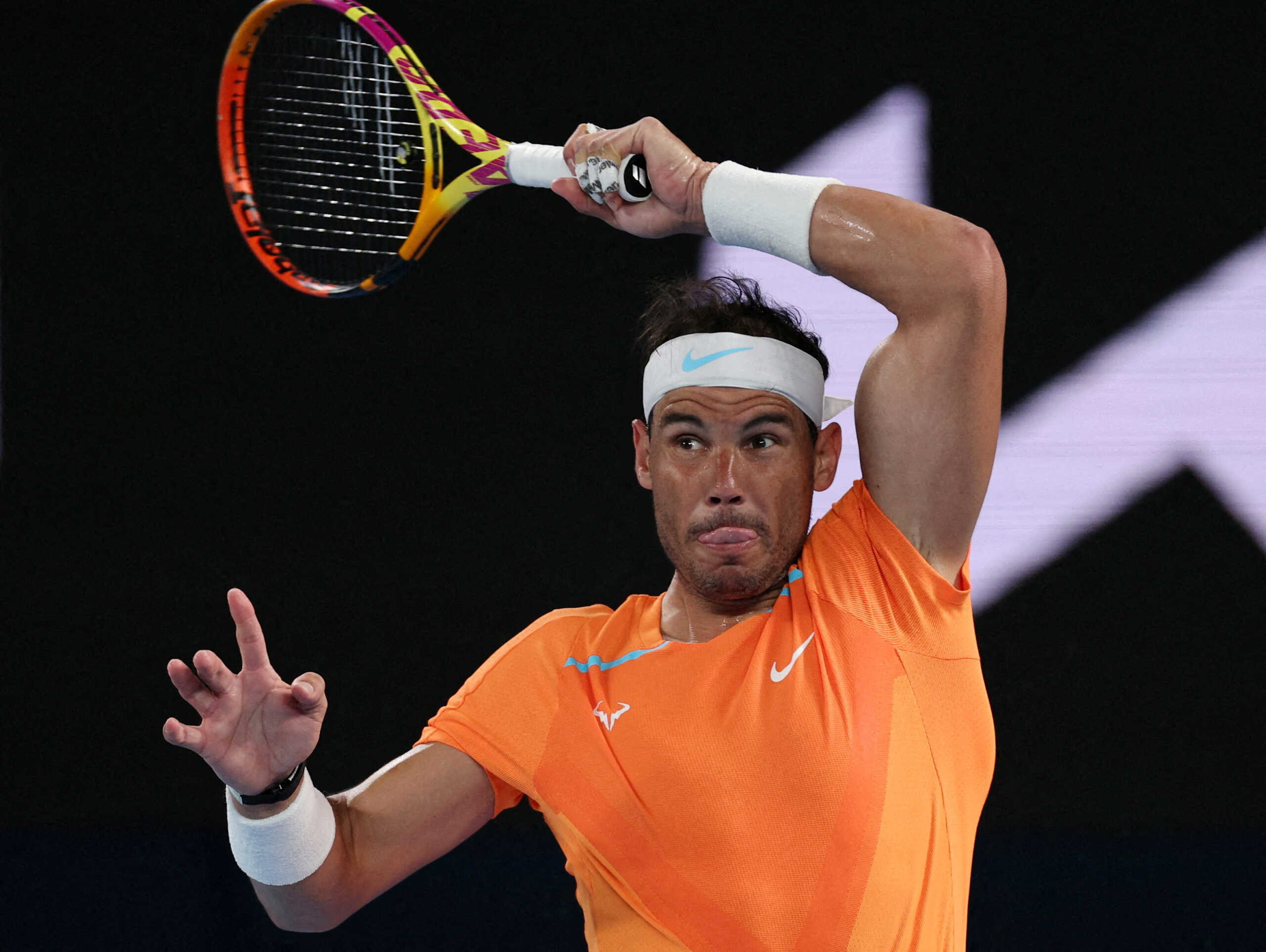FILE PHOTO: Tennis - Australian Open - Melbourne Park, Melbourne, Australia - January 18, 2023 Spain's Rafael Nadal in action during his second round match against Mackenzie Mcdonald of the U.S. REUTERS