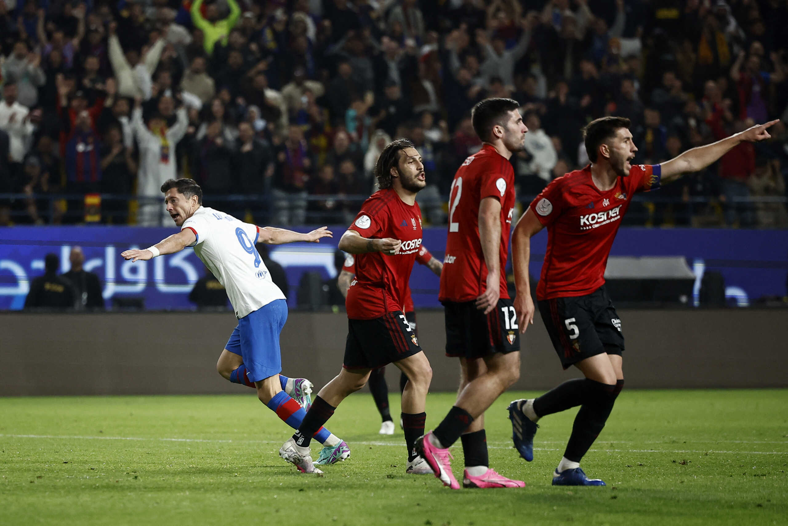 Soccer Football - Spanish Super Cup - Semi Final - FC Barcelona v Osasuna - Al-Awwal Park, Riyadh, Saudi Arabia - January 11, 2024 FC Barcelona's Robert Lewandowski celebrates scoring their first goal REUTERS