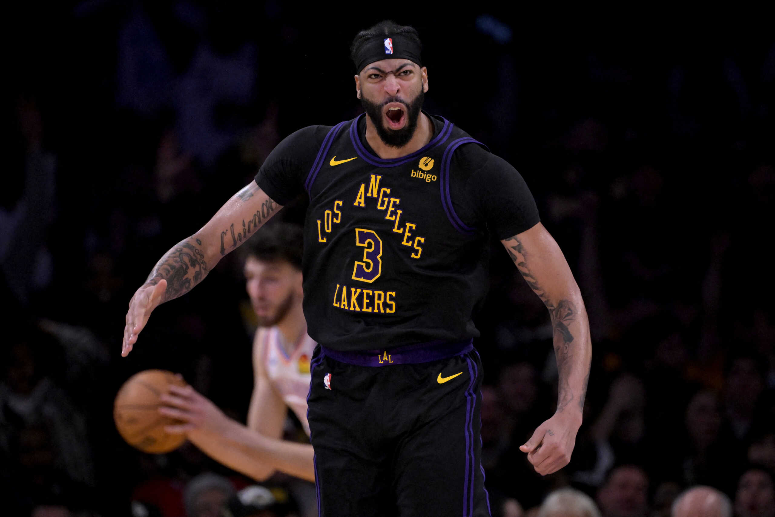 Jan 15, 2024; Los Angeles, California, USA;  Los Angeles Lakers forward Anthony Davis (3) reacts after a dunk in the second half against the Oklahoma City Thunder at Crypto.com Arena. Mandatory Credit: Jayne Kamin-Oncea-USA TODAY Sports