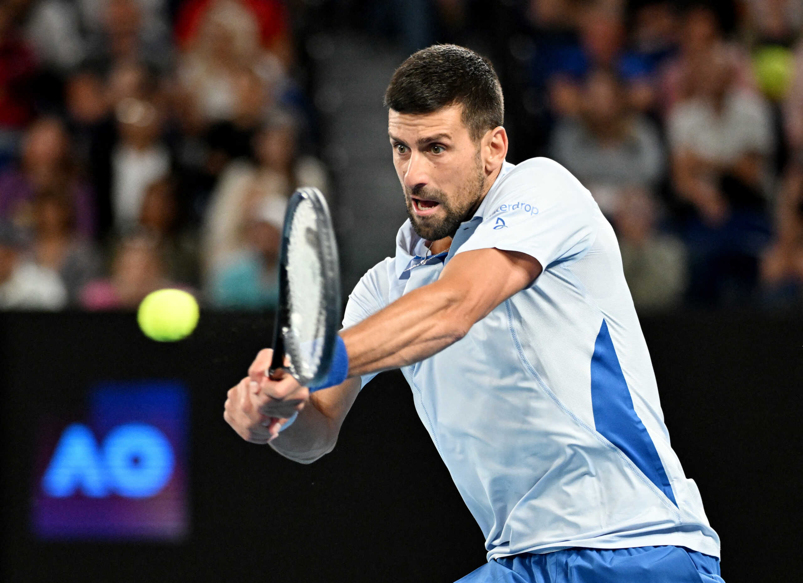 Tennis - Australian Open - Melbourne Park, Melbourne, Australia - January 17, 2024 Serbia's Novak Djokovic in action during his second round match against Australia's Alexei Popyrin REUTERS