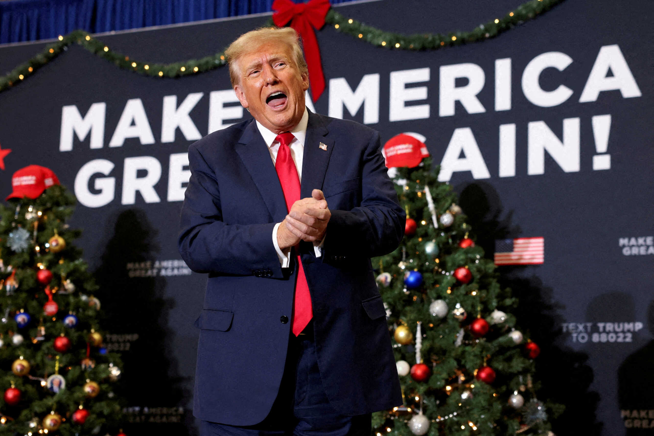 FILE PHOTO: Republican presidential candidate and former U.S. President Donald Trump attends a campaign event in Waterloo, Iowa, U.S. December 19, 2023. REUTERS