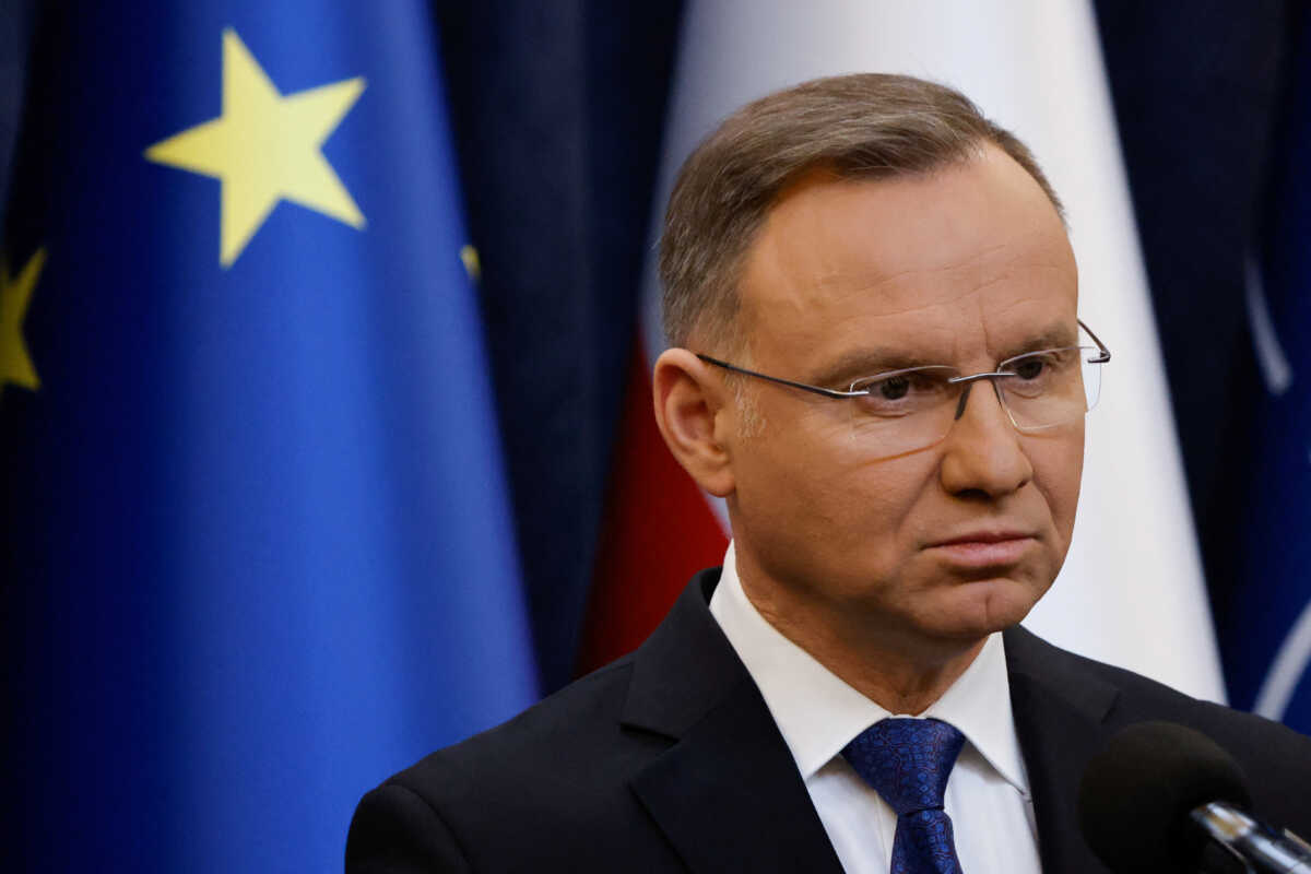 Polish President Andrzej Duda looks on as he gives a statement to media after police entered Poland's presidential palace on January 9, to detain former Interior Minister Mariusz Kaminski and his deputy Maciej Wasik, in Warsaw, Poland, January 10, 2024. REUTERS