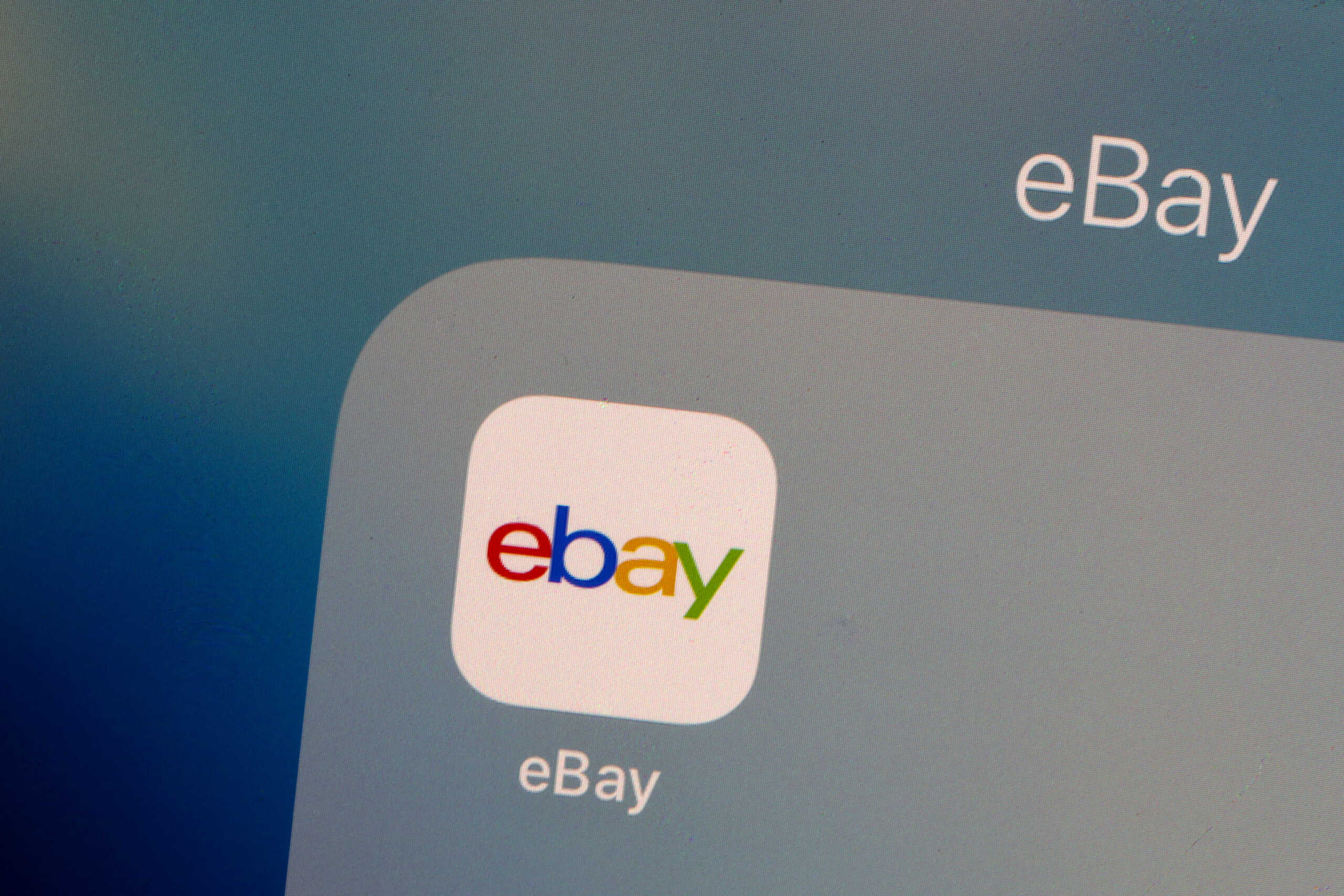 FILE PHOTO: The eBay logo is pictured on a phone screen in this photo illustration in New York, U.S., July 23, 2019. REUTERS