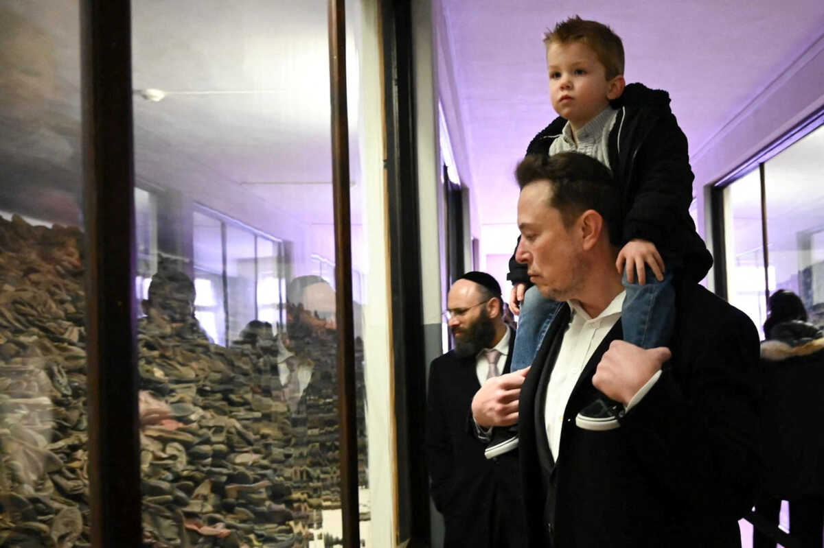 Elon Musk takes part in a private visit to Auschwitz-Birkenau with European Jewish Association (EJA) Chairman Rabbi Menachem Margolin, Ben Shapiro and Holocaust survivor Gidon Lev in Oswiecim, Poland January 22, 2024. European Jewish Association