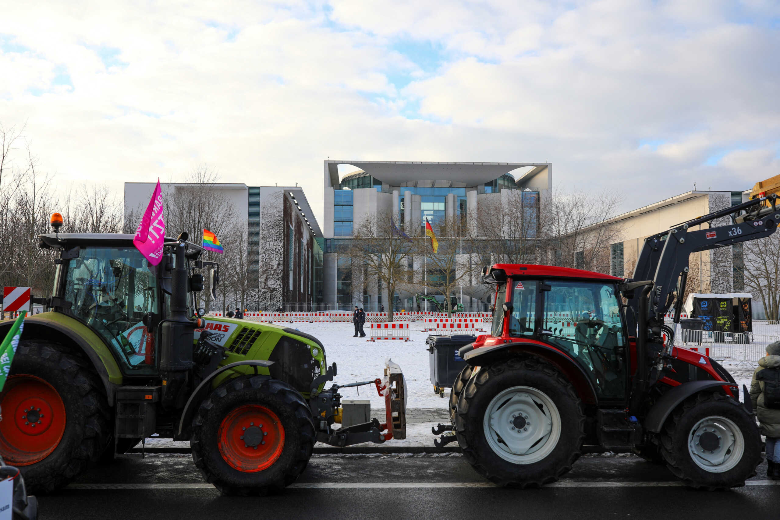 Tractors are parked in front of the Chancellery during a protest by German farmers, on the day of the 16th Global Forum for Food and Agriculture during Green Week agriculture fair, near the Reichstag building in Berlin, Germany January 20, 2024. REUTERS