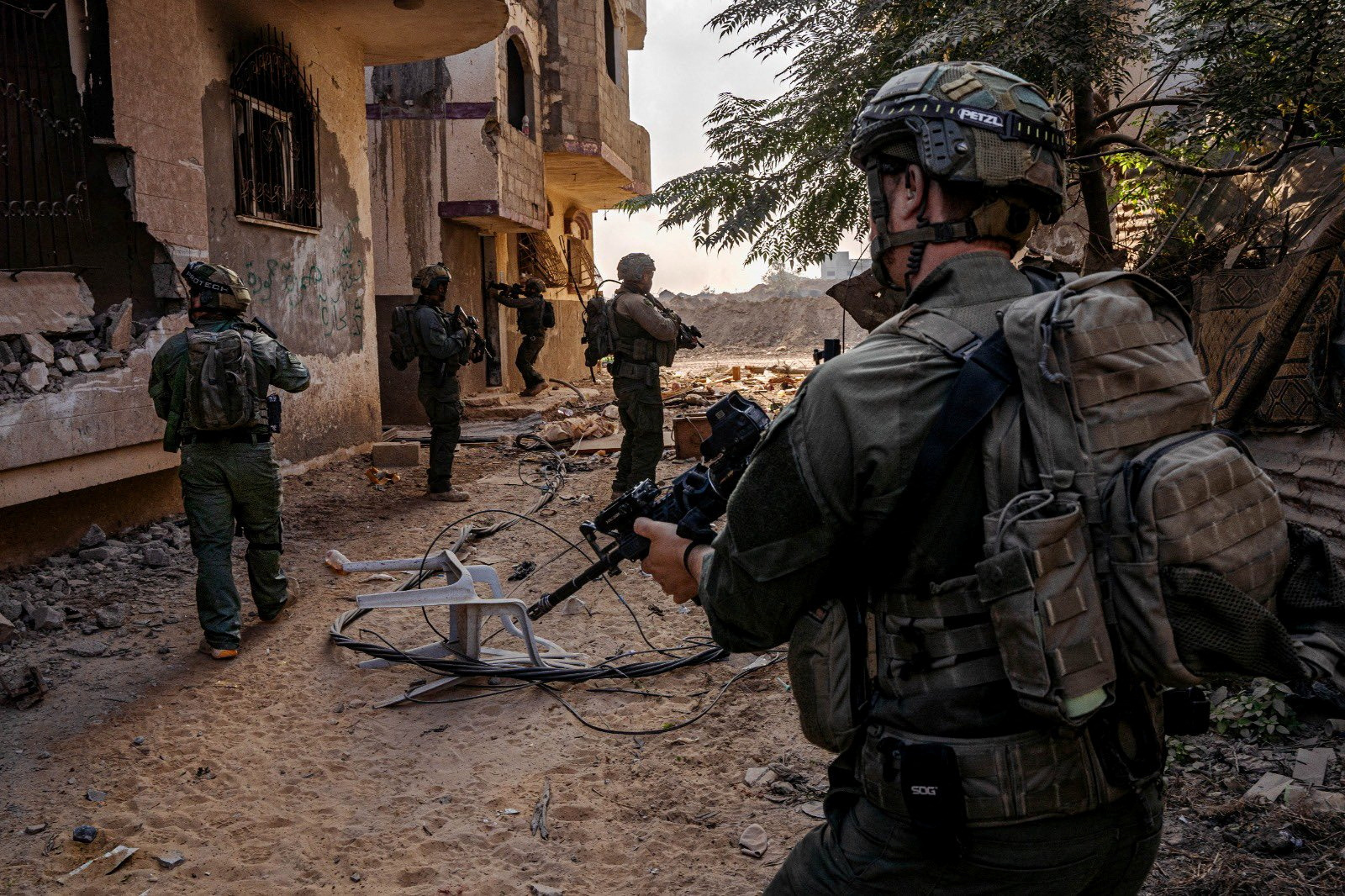 Israeli soldiers operate in the Gaza Strip amid the ongoing conflict between Israel and the Palestinian Islamist group Hamas, in this handout picture released on January 3, 2024. Israel Defense Forces