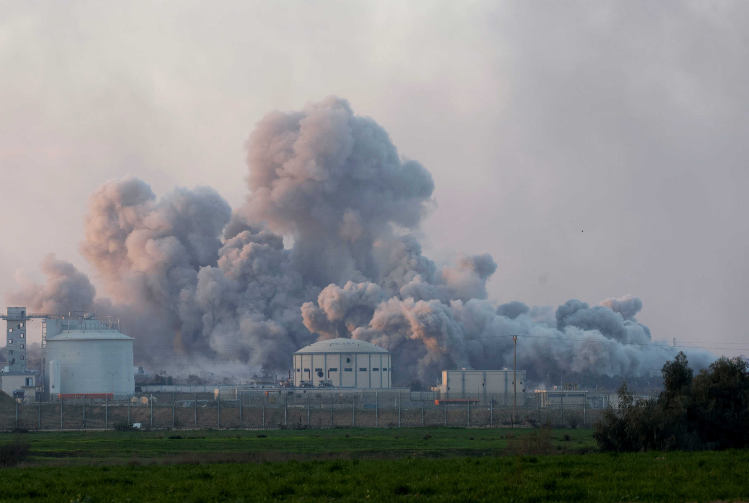 A smoke rises following an explosion in Central Gaza, amid the ongoing conflict between Israel and the Palestinian Islamist group Hamas, near the Israel-Gaza border, as seen from Israel, January 6, 2024. REUTERS