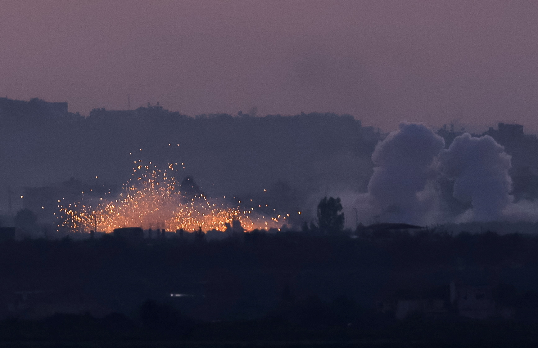 An explosion takes place during Israeli air strikes in Gaza, amid the ongoing conflict between Israel and the Palestinian Islamist group Hamas, as seen from southern Israel, January 17, 2024. REUTERS