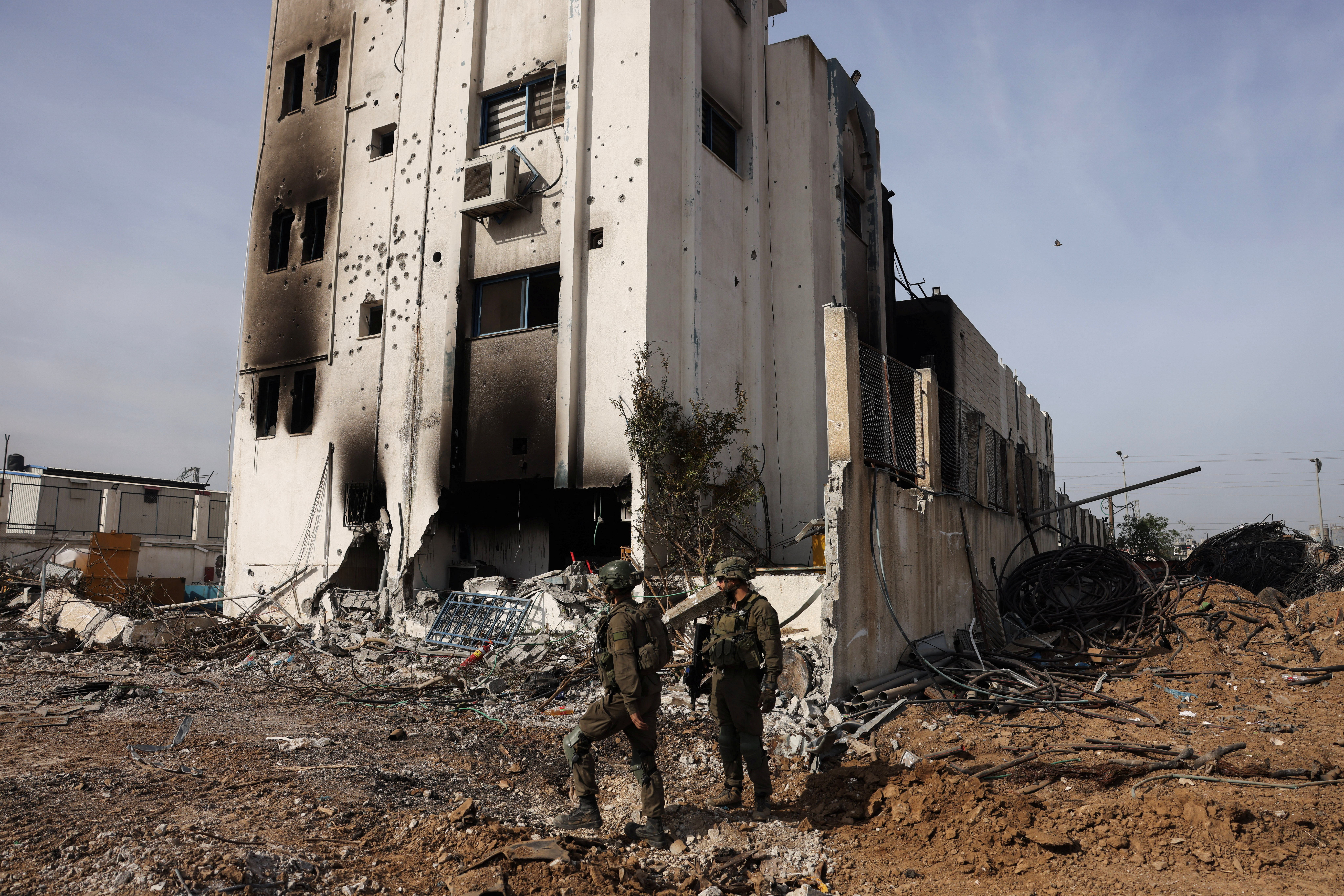 Israeli soldiers operate, amid the ongoing conflict between Israel and the Palestinian Islamist group Hamas, in Gaza, January 8, 2024. REUTERS