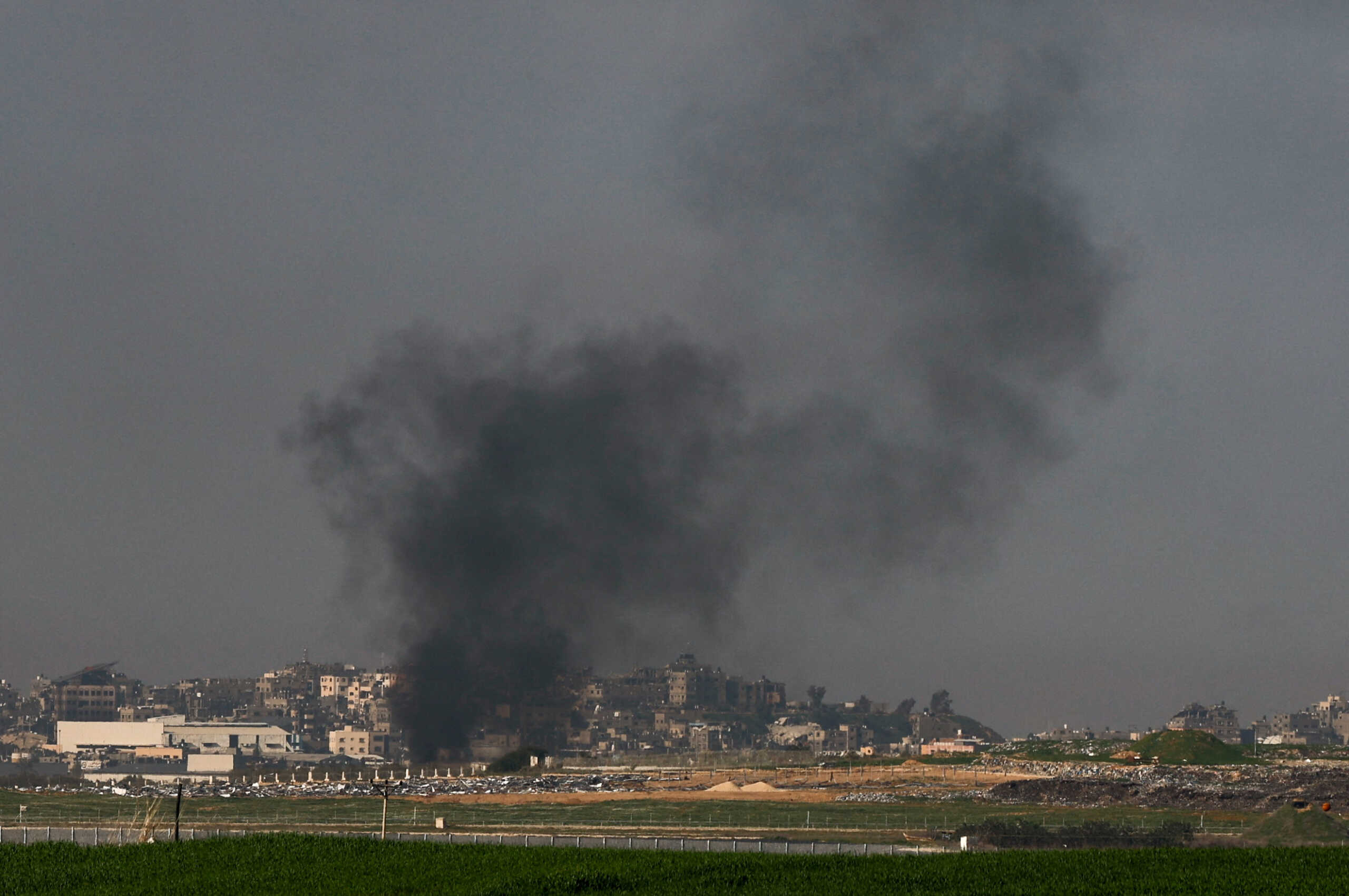 Smoke rises from Gaza, amid the ongoing conflict between Israel and the Palestinian Islamist group Hamas, as seen from southern Israel, January 21, 2024. REUTERS