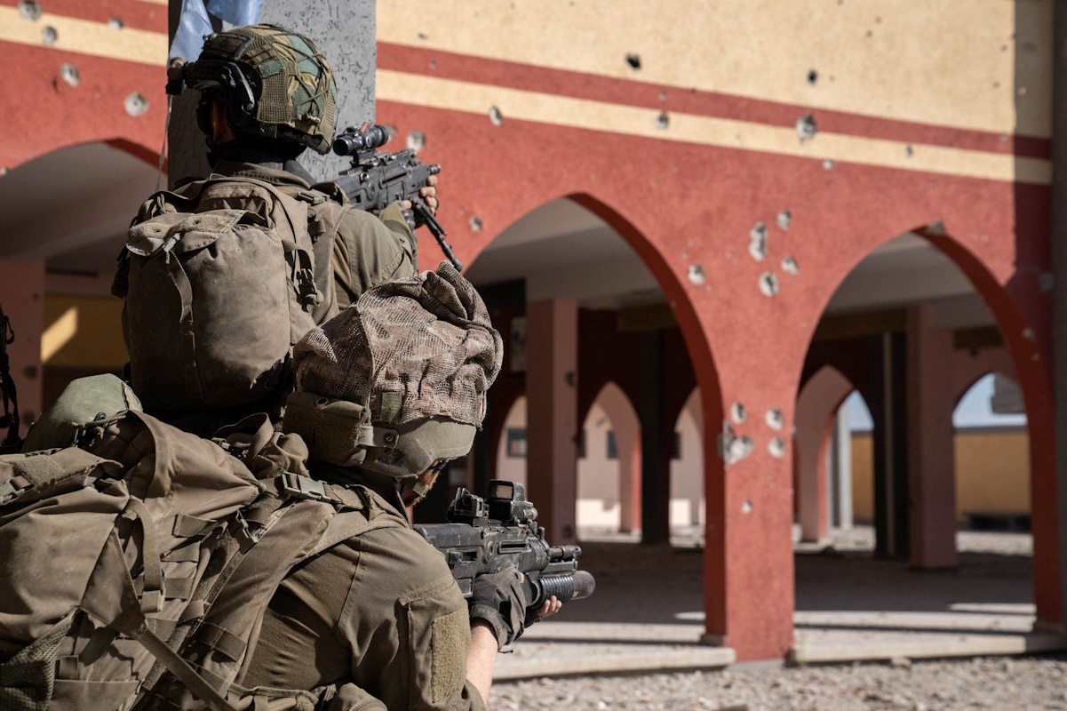 Israeli soldiers operate in the Gaza Strip amid the ongoing conflict between Israel and the Palestinian Islamist group Hamas, in this handout picture released on January 21, 2024. Israel Defense Forces