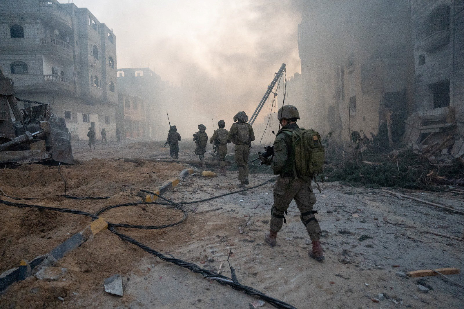 Israeli soldiers operate in the Gaza Strip amid the ongoing conflict between Israel and the Palestinian Islamist group Hamas, in this handout picture released on January 21, 2024. Israel Defense Forces