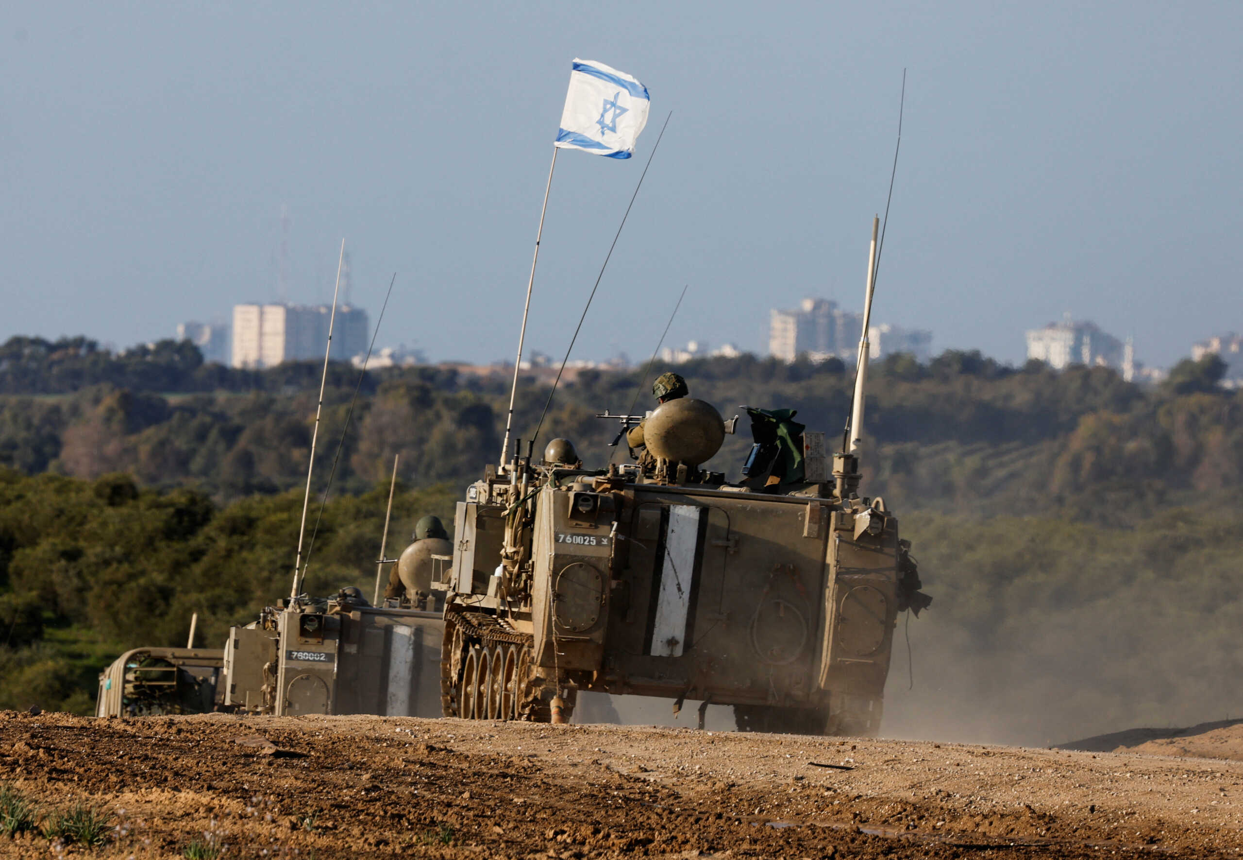 An Israeli convoy manoeuvres near the Israel-Gaza border, amid the ongoing conflict between Israel and the Palestinian Islamist group Hamas, in Israel, January 25, 2024. REUTERS