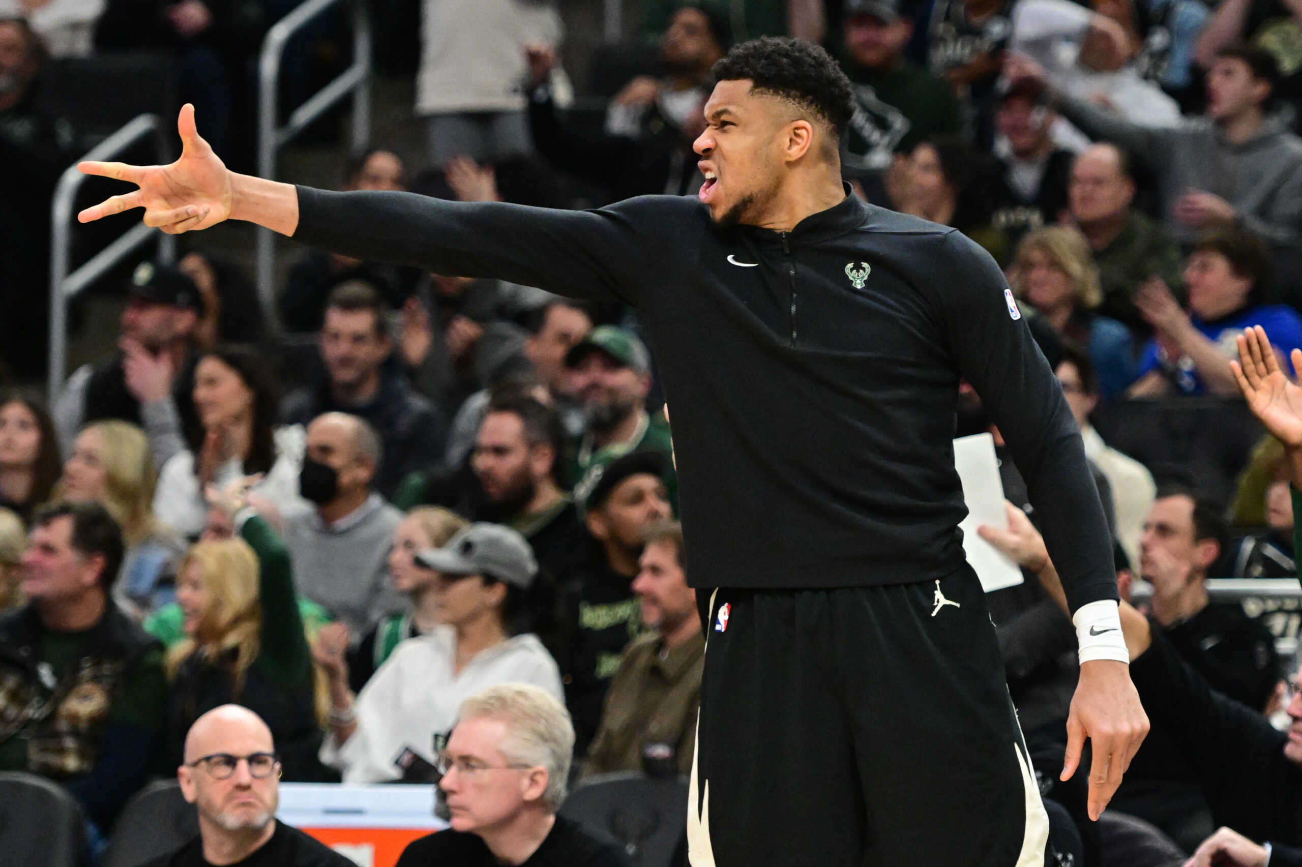 Jan 11, 2024; Milwaukee, Wisconsin, USA; Milwaukee Bucks forward Giannis Antetokounmpo (34) reacts after a Bucks score against the Boston Celtics in the fourth quarter at Fiserv Forum. Mandatory Credit: Benny Sieu-USA TODAY Sports