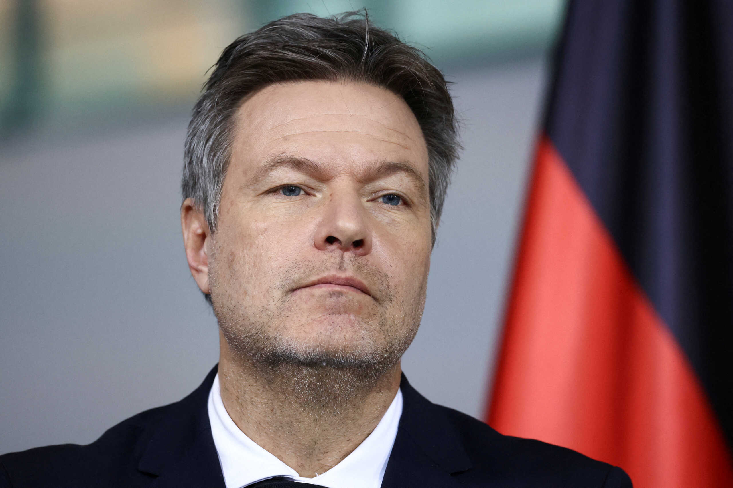 FILE PHOTO: German Economy and Climate Minister Robert Habeck presents the 2024 budget with Finance Minister Christian Lindner and Chancellor Olaf Scholz in Berlin, Germany, December 13, 2023. REUTERS