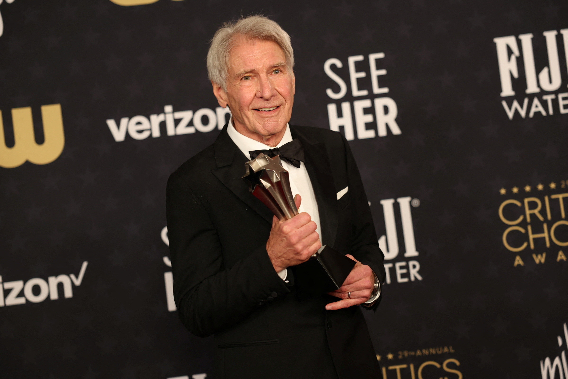 Harrison Ford poses with the Career Achievement Award at the 29th Annual Critics Choice Awards, in Santa Monica, California, U.S., January 14, 2024. REUTERS