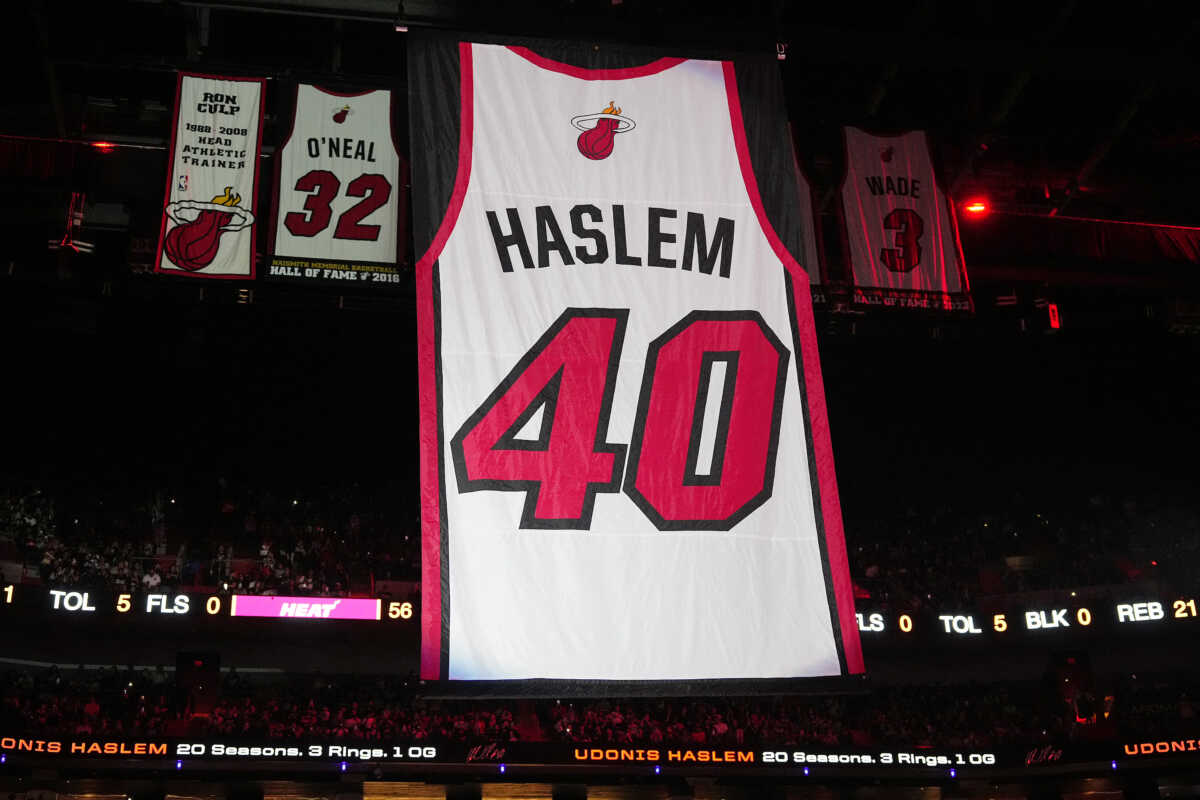 Jan 19, 2024; Miami, Florida, USA; The jersey of Udonis Haslem is lifted to the rafters during the retirement ceremony during halftime of the game between the Miami Heat and the Atlanta Hawks Kaseya Center. Mandatory Credit: Jasen Vinlove-USA TODAY Sports