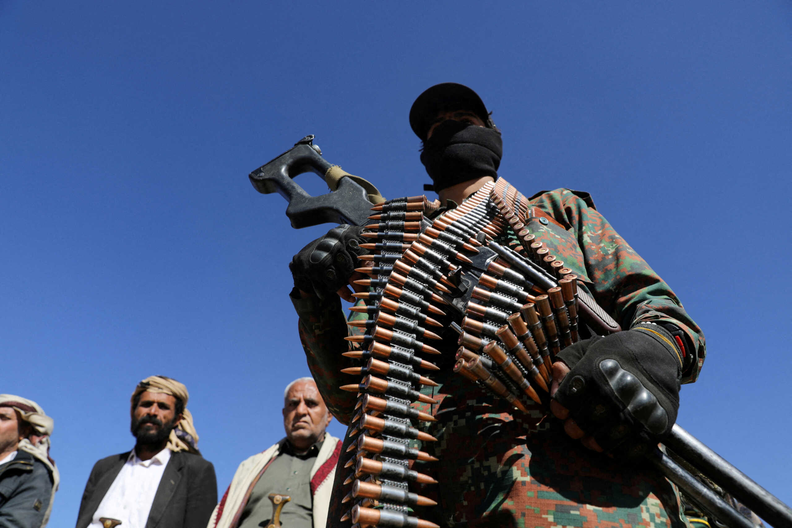 FILE PHOTO: A Houthi policeman takes part in a protest against recent U.S.-led strikes on Houthi targets, near Sanaa, Yemen January 14, 2024. REUTERS