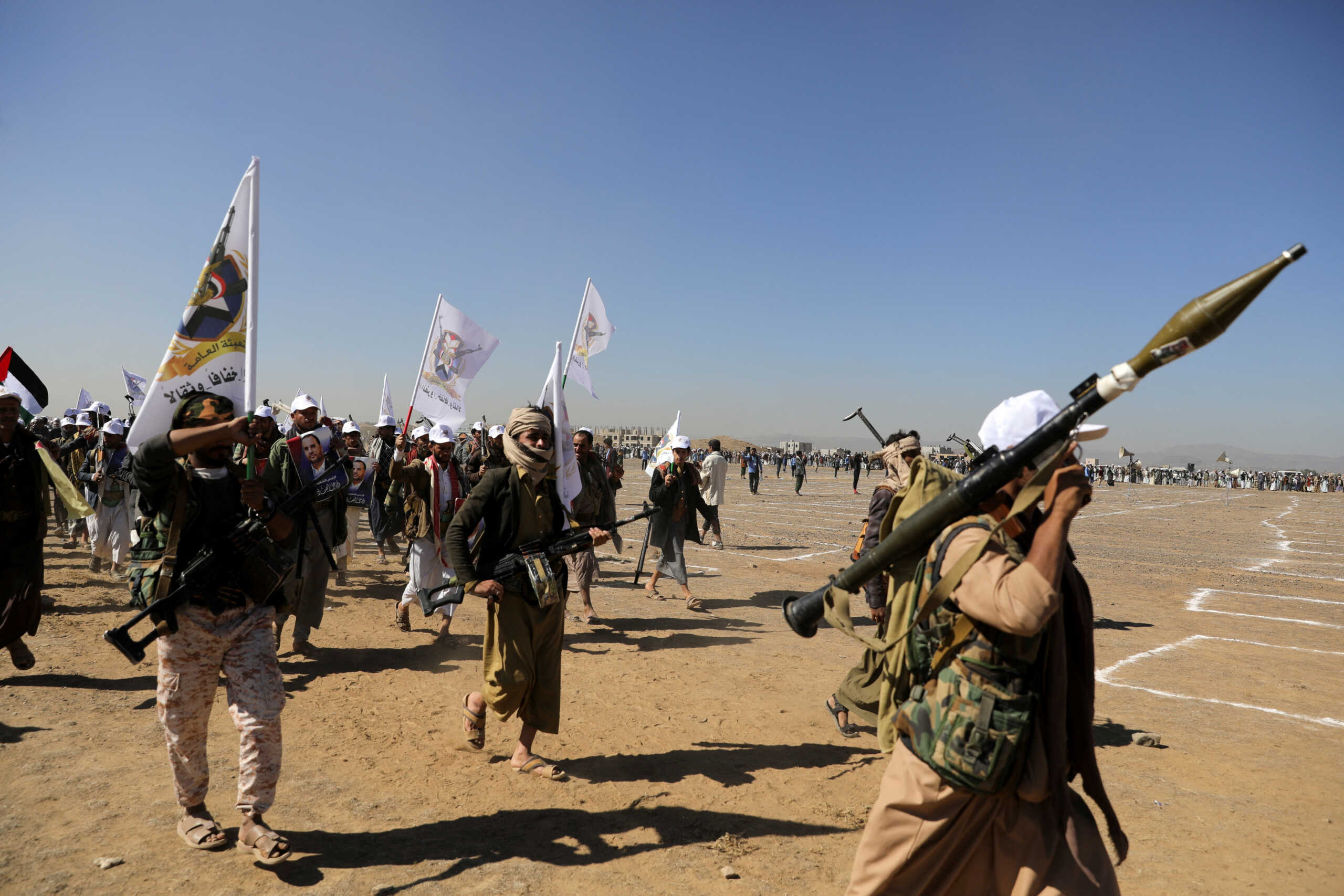 Armed Houthi followers take part in a parade during a protest to decry the U.S.-led strikes on Houthi targets and to show support to Palestinians in the Gaza Strip, amid the ongoing conflict between Israel and the Palestinian Islamist group Hamas, near Sanaa, Yemen January 25, 2024. REUTERS